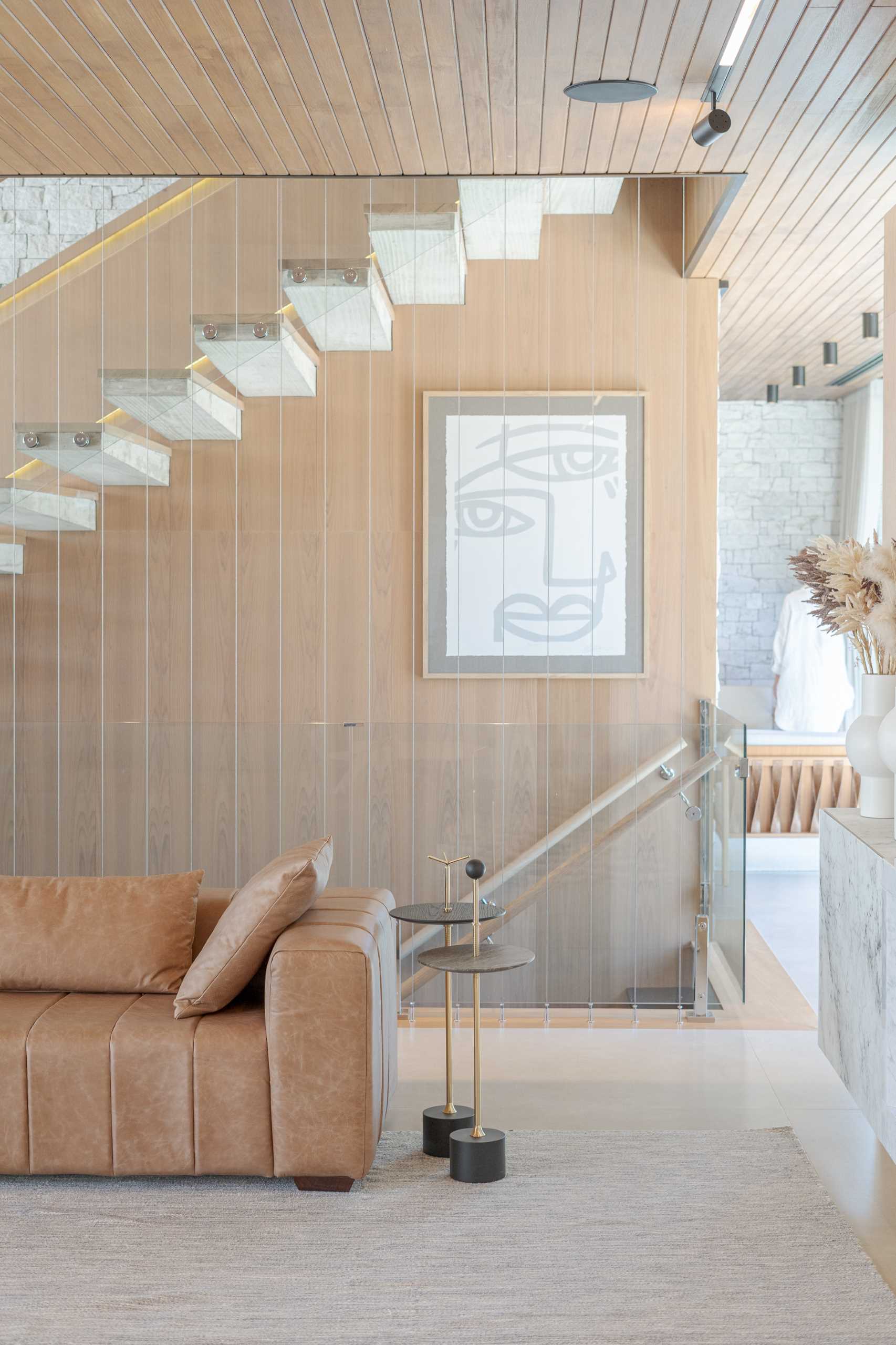 Modern wood and concrete stairs with hidden lighting.