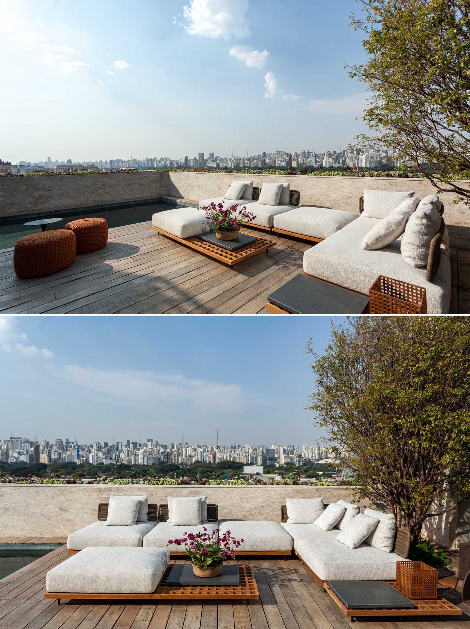 A rooftop deck with a lounge and outdoor dining area, as well as a small pool for hot days. The outdoor space has an unobstructed view of the city lights.