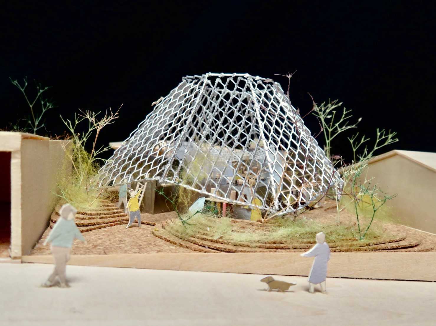 The model of a modern house with an octagonal design that was inspired by a spiderweb.