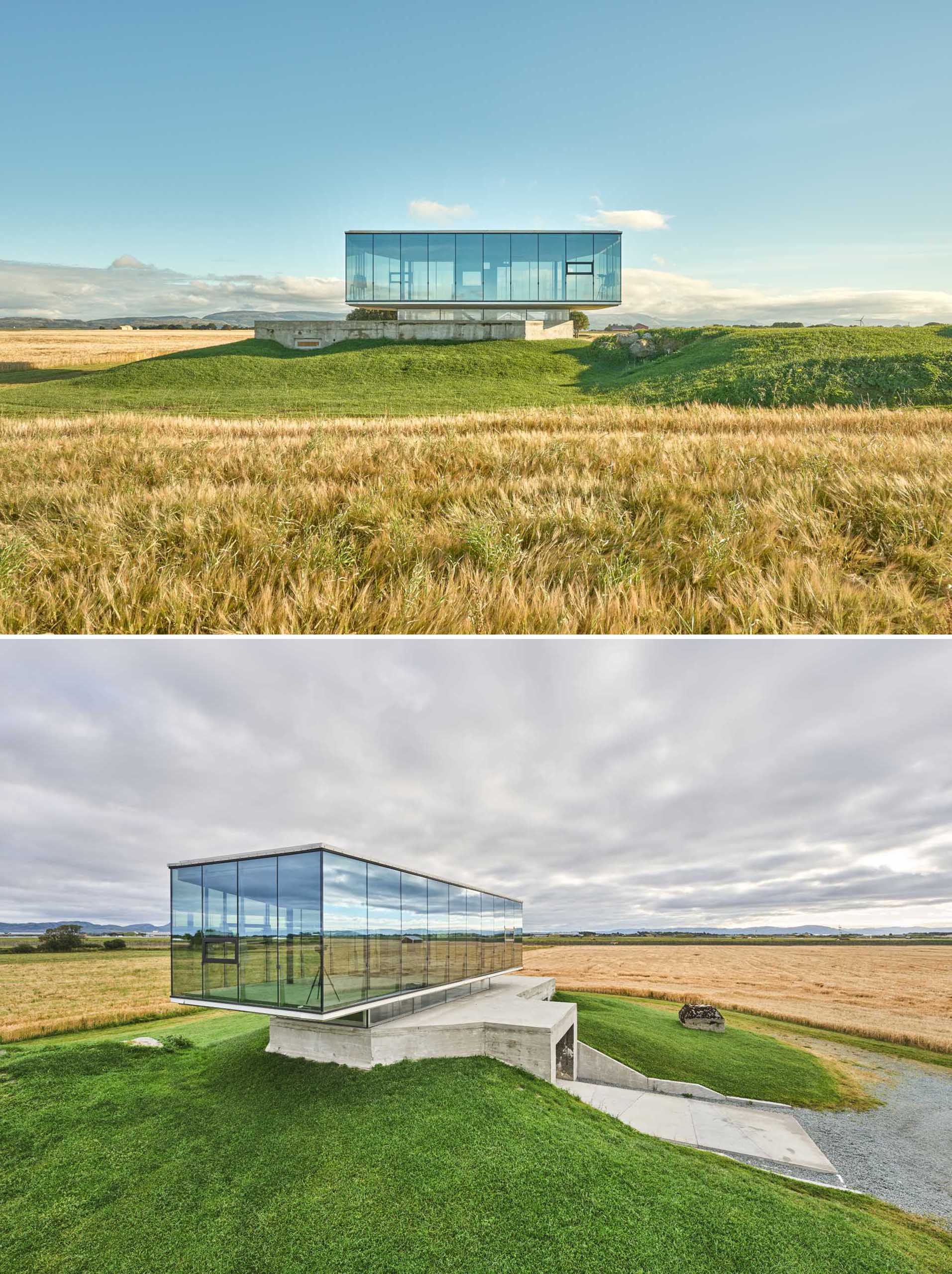 An old military bunker has been transformed into an event space with a glass-enclosed box.