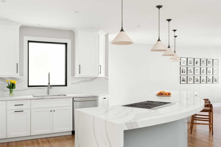 An S-Shaped Kitchen Island Flows Through This Remodeled Home