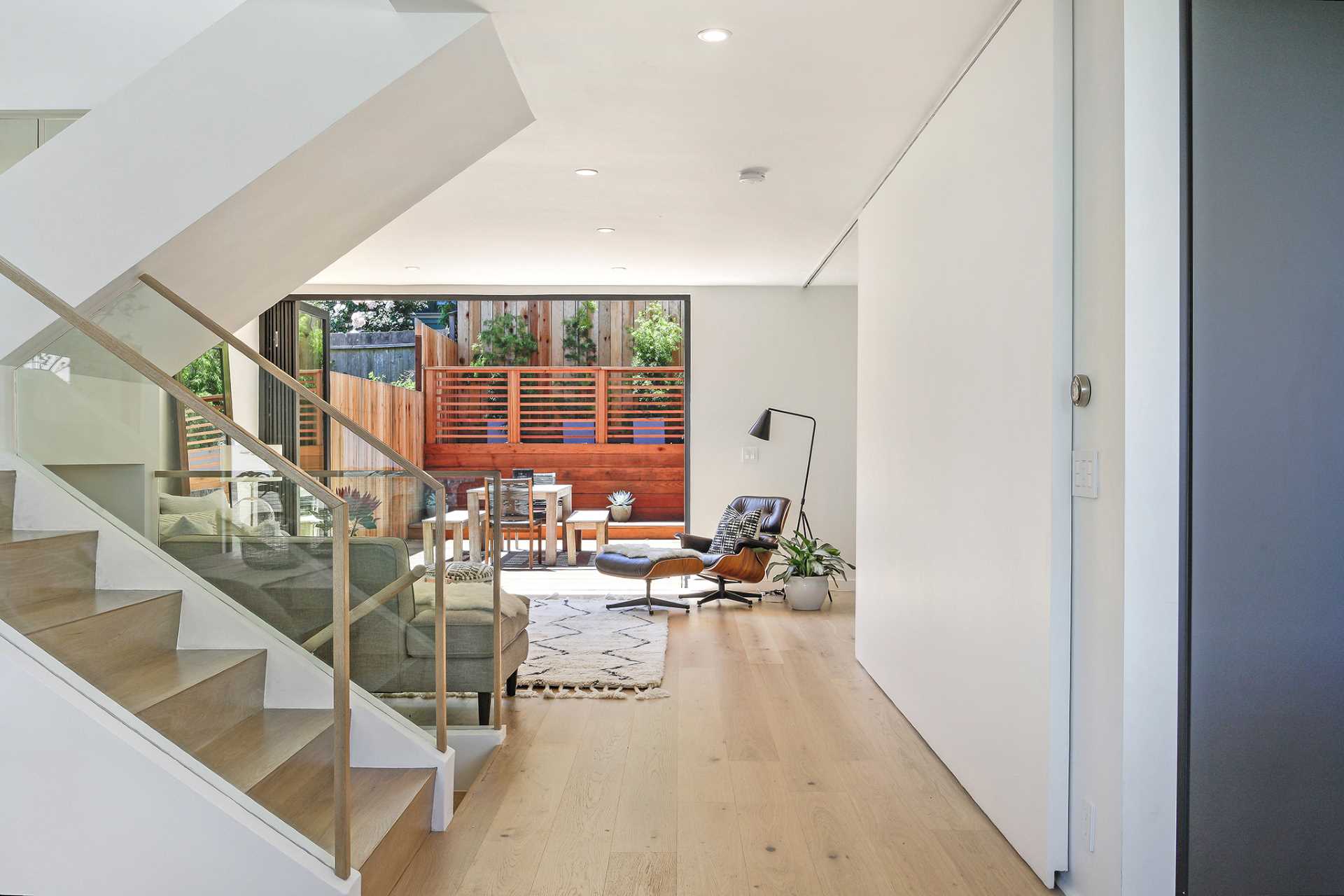 Folding glass doors open the living room to the patio.