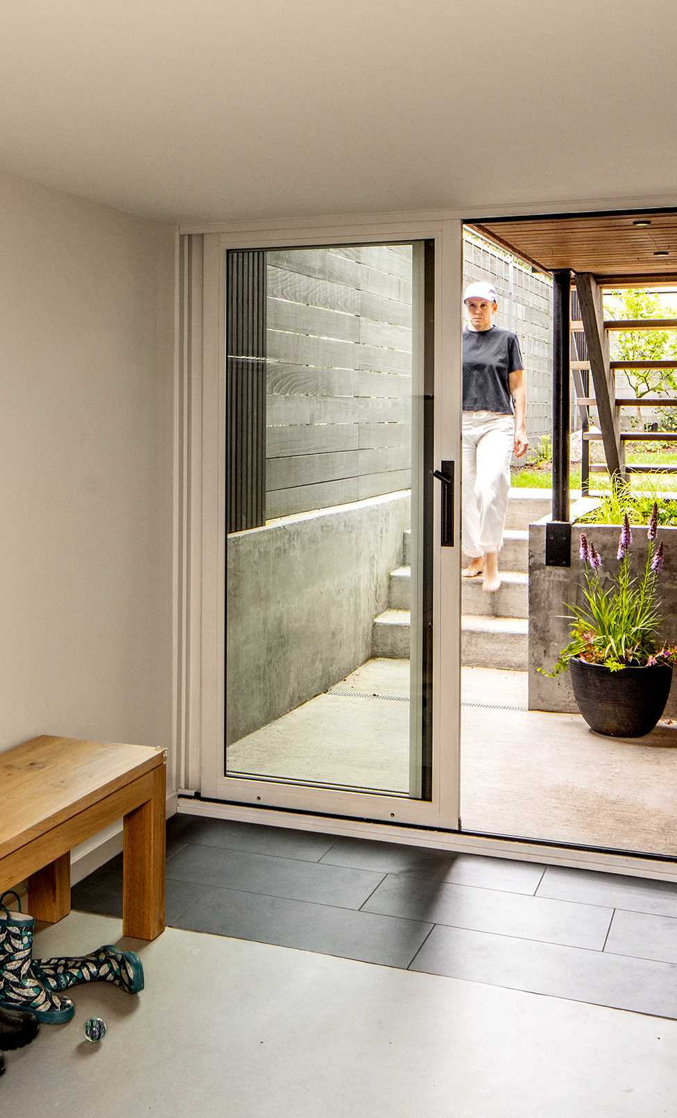 A remodeled basement includes a door to connect to the backyard.