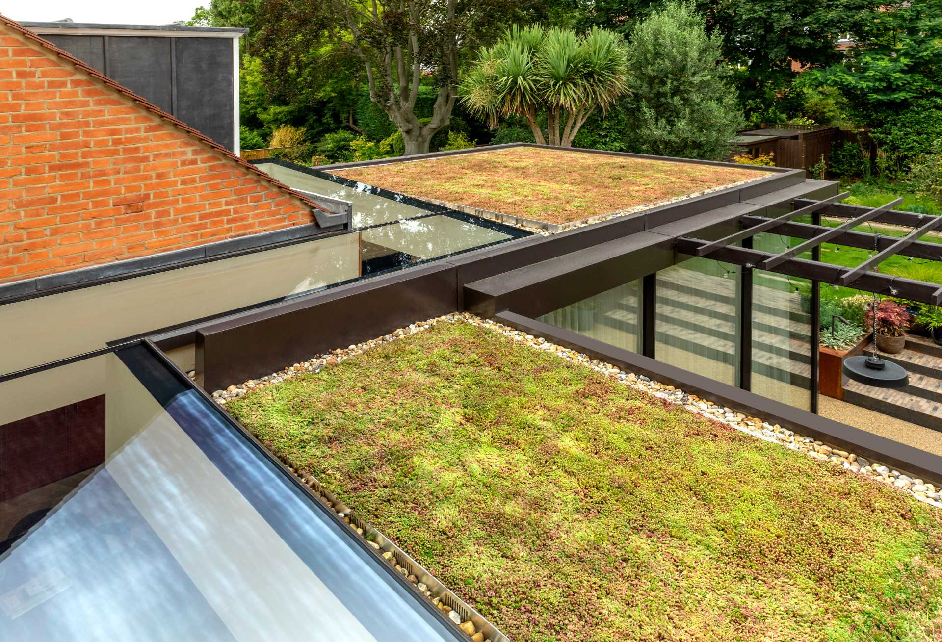 A contemporary extension with a green roof.
