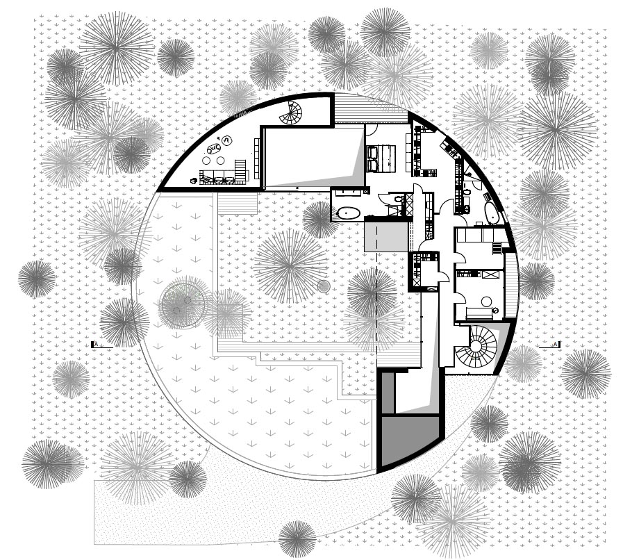 The floor plan of a modern round home.