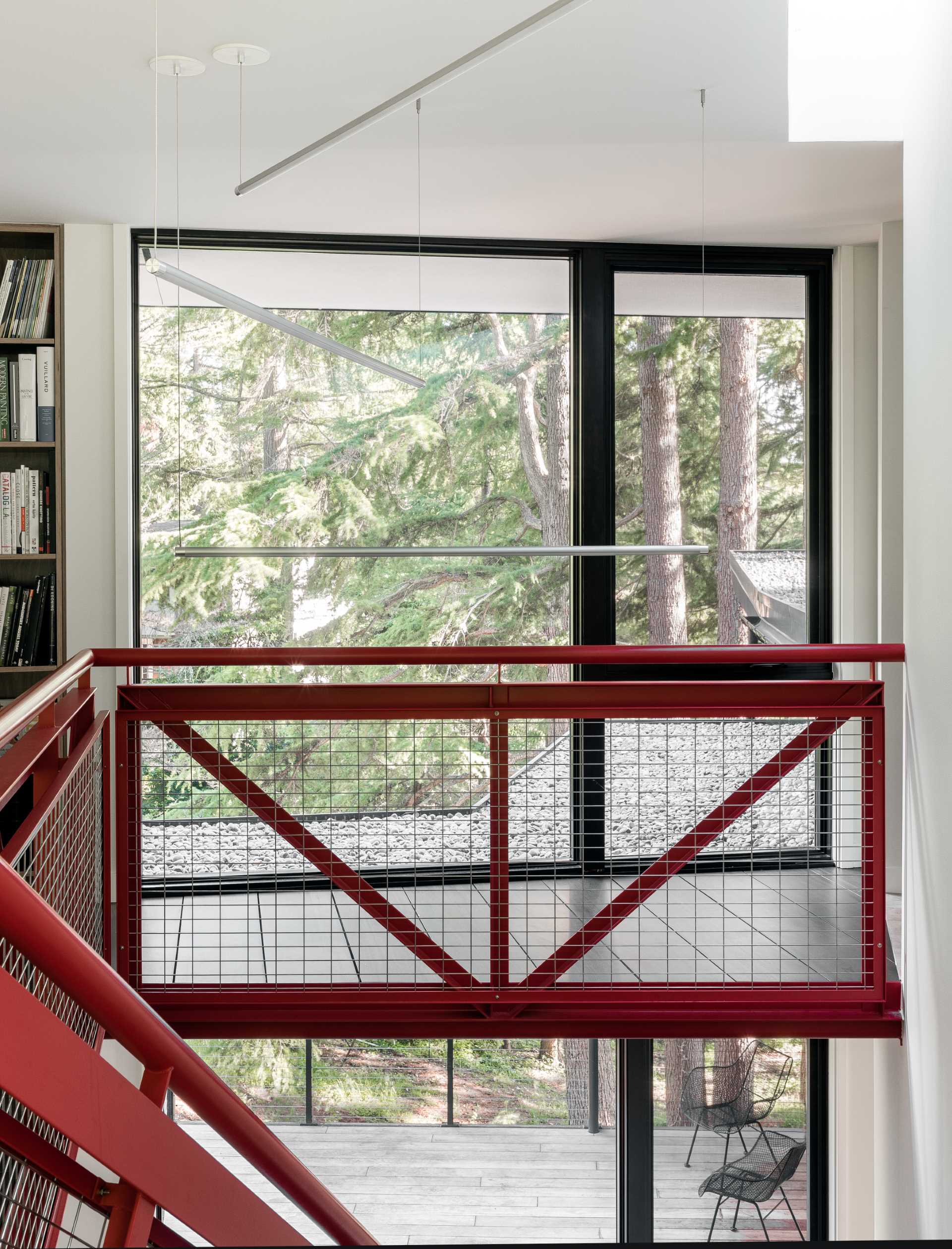 A modern house with a red staircase.