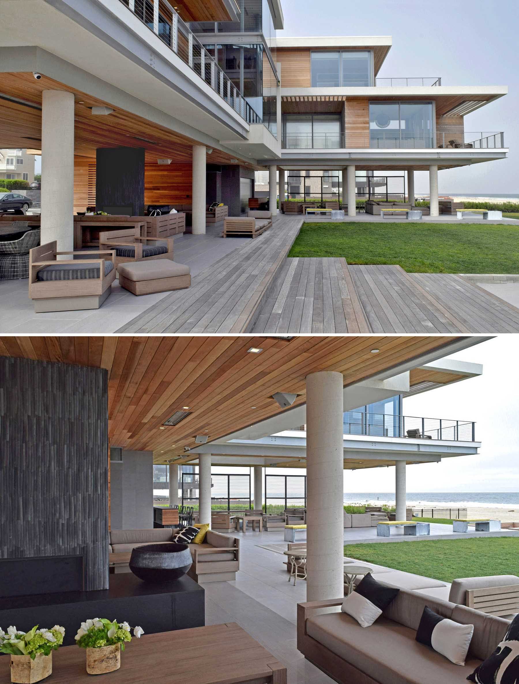 A modern hurricane-proof house is cantilevered atop 12-foot concrete piers.