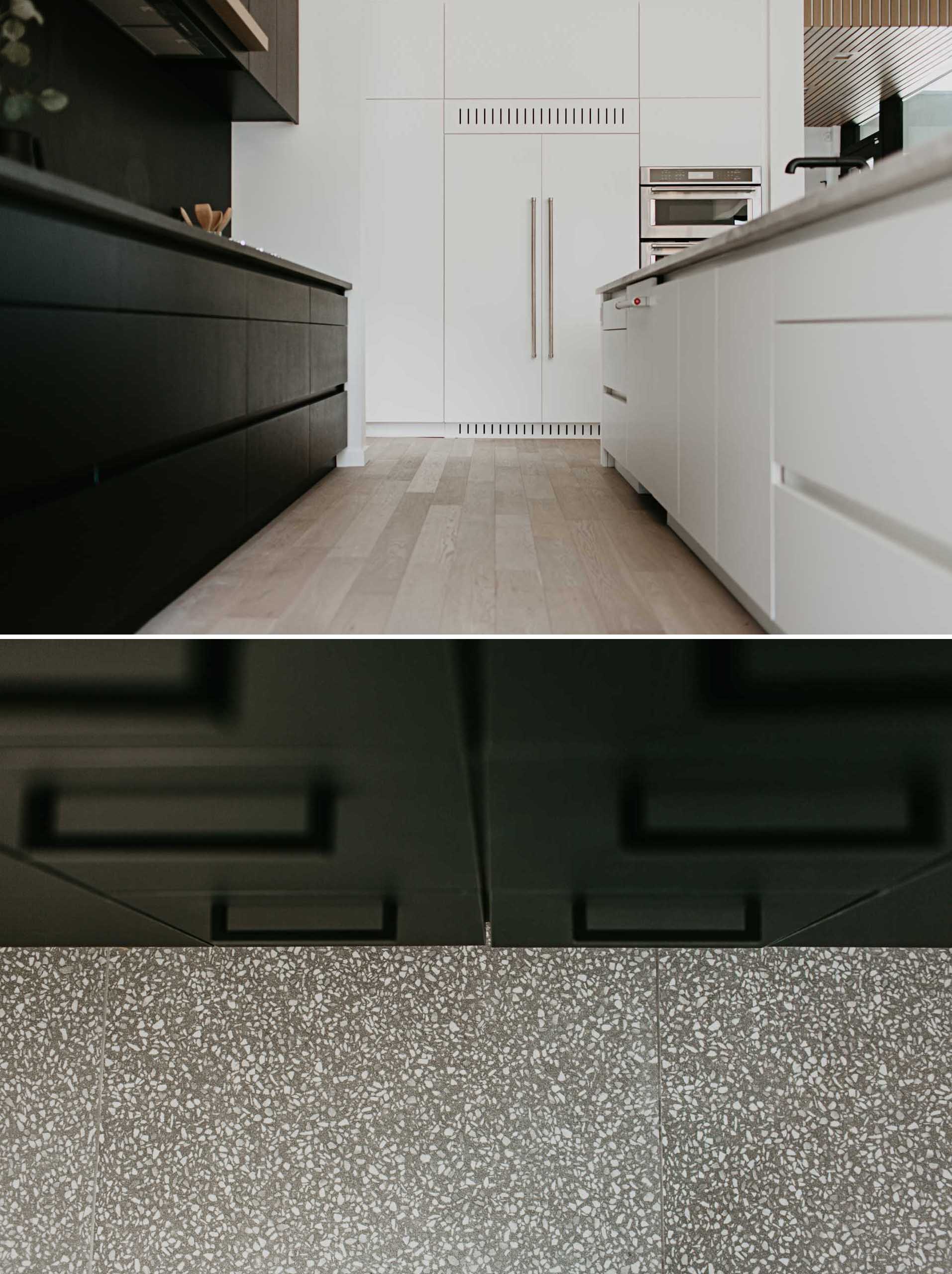 In this modern kitchen, absolute black granite is leathered on the back counter and splashback, which match the stained black wood cabinets and drawers.