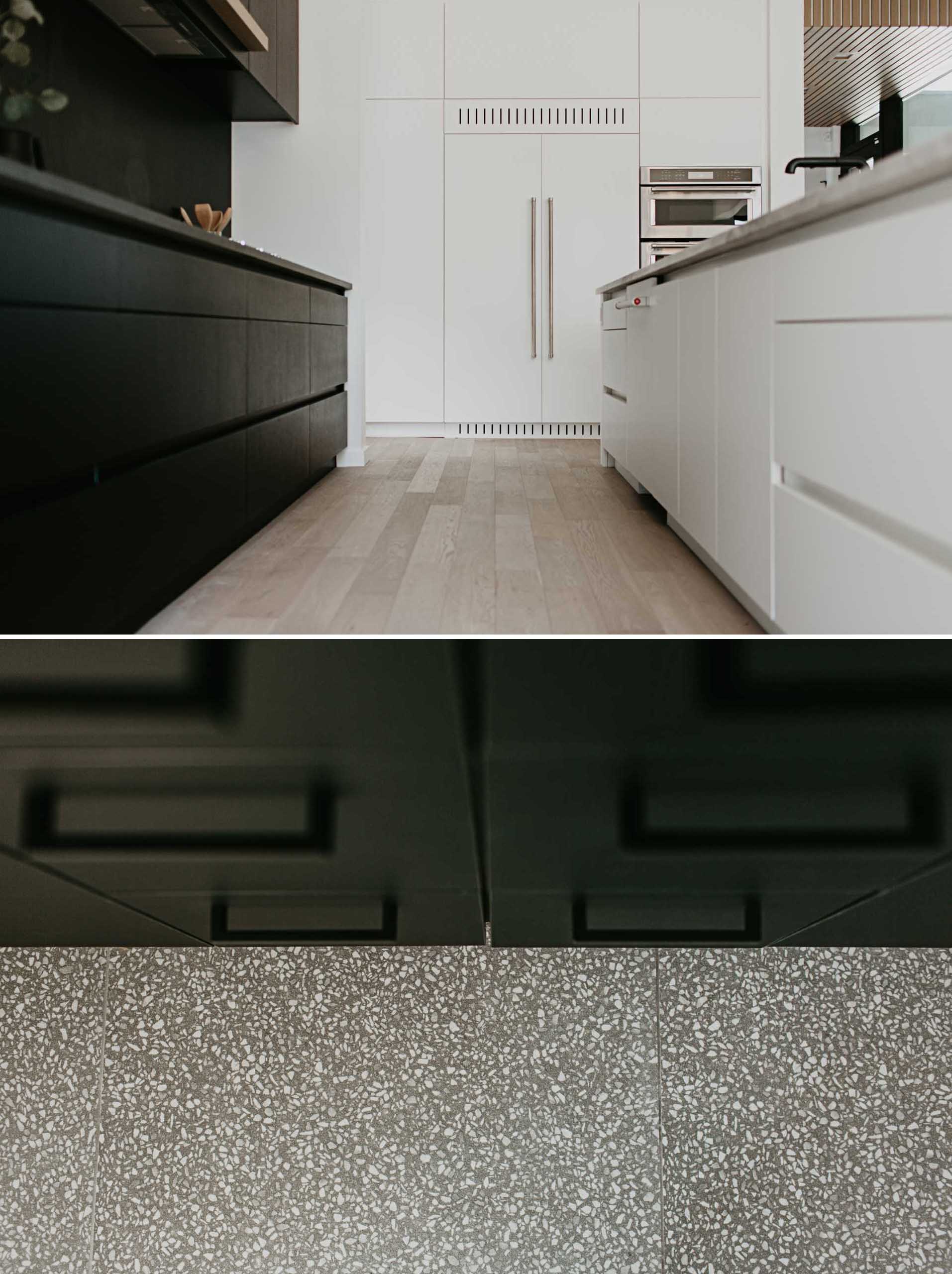 In this modern kitchen, absolute black granite is leathered on the back counter and splashback, which match the stained black wood cabinets and drawers. 