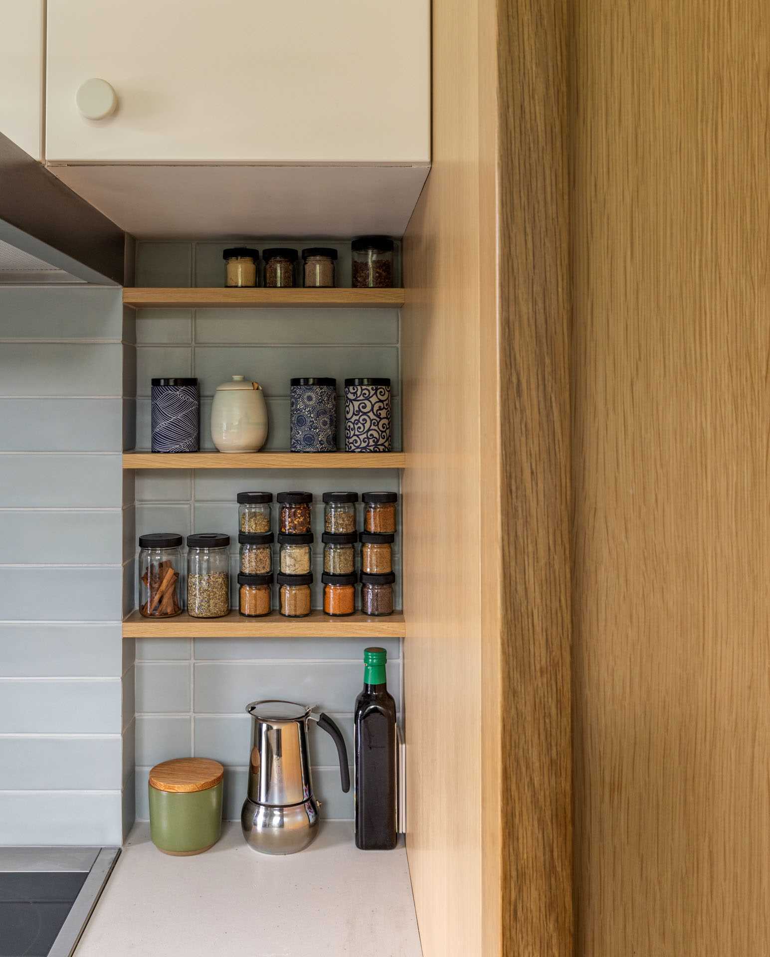 A modern kitchen with a simple and neutral colour palette.