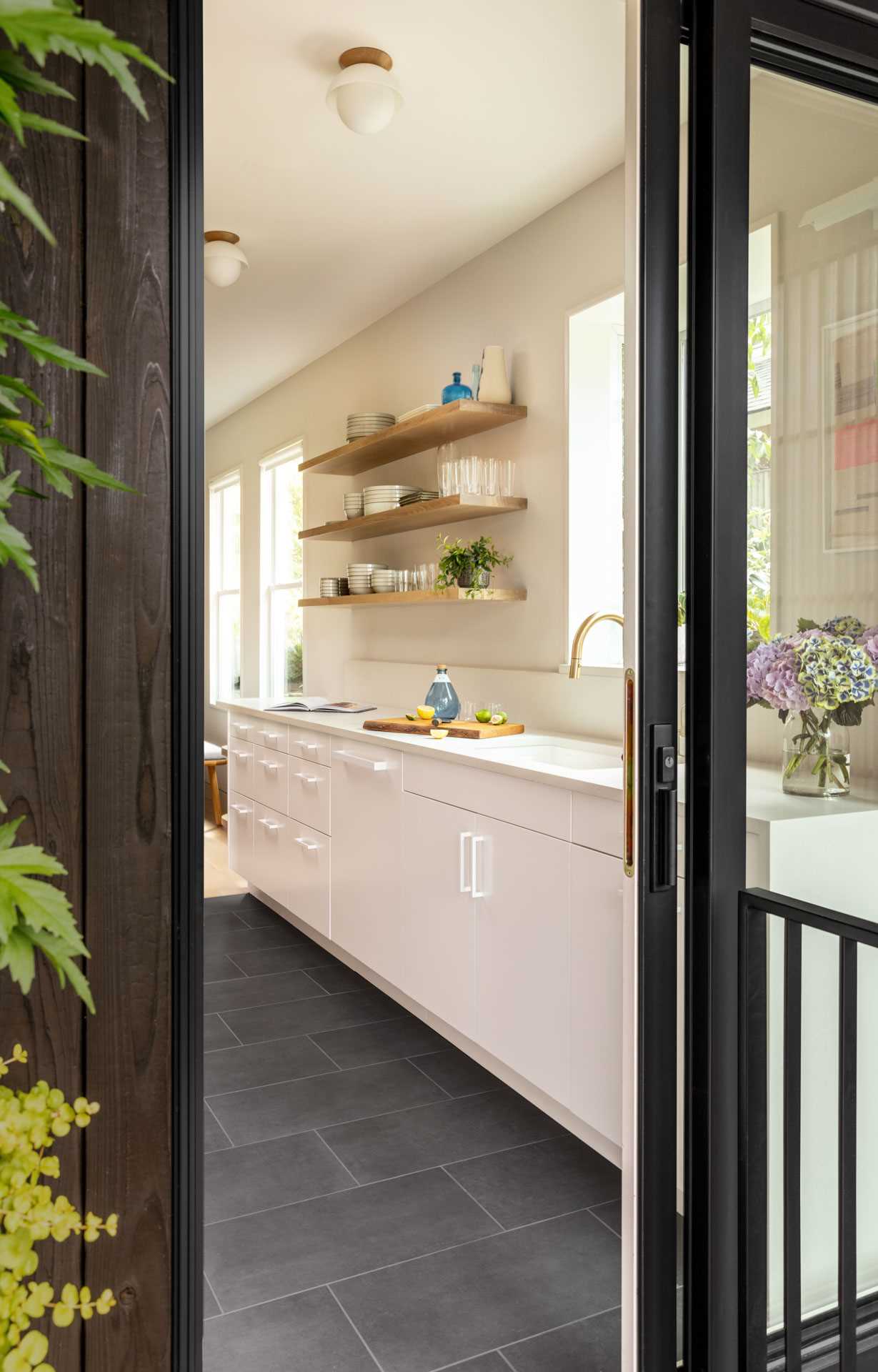 A modern kitchen with a simple and neutral colour palette.