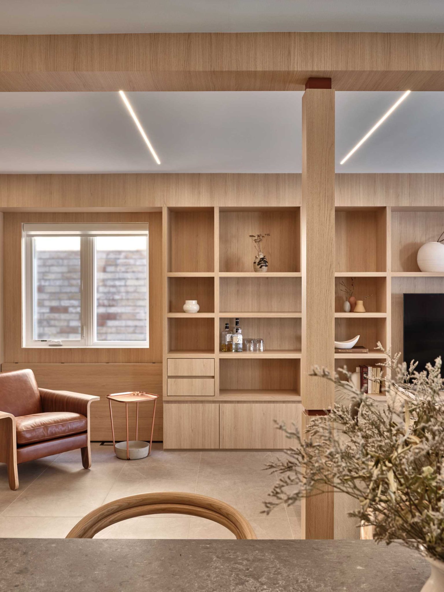 Wall-To-Wall Built-In Wood Cabinetry Create A Warm Interior For This ...