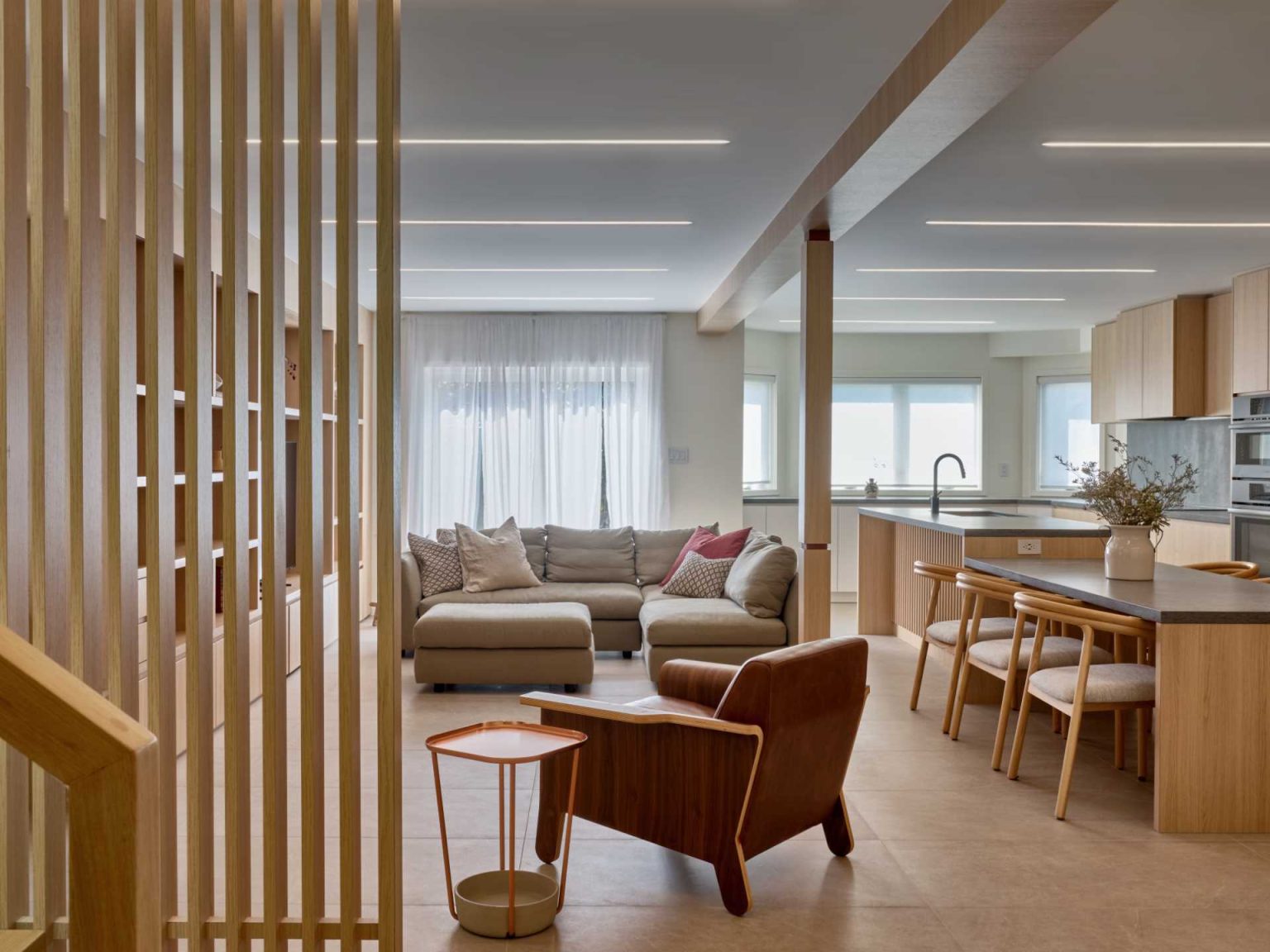 Wall-To-Wall Built-In Wood Cabinetry Create A Warm Interior For This ...