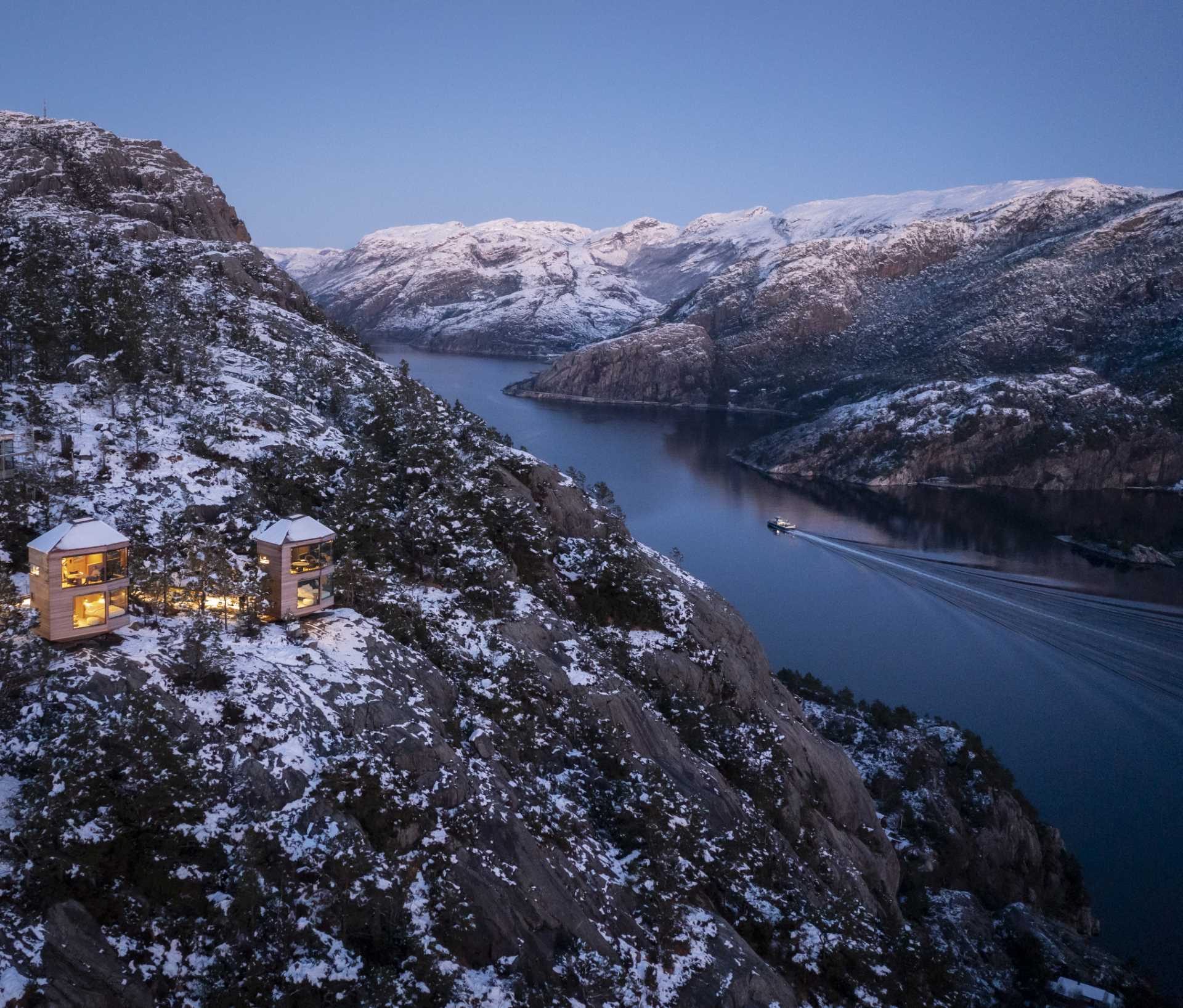 Modern cabins that have been built to blend in with the landscape with a minimal footprint on the surrounding nature.