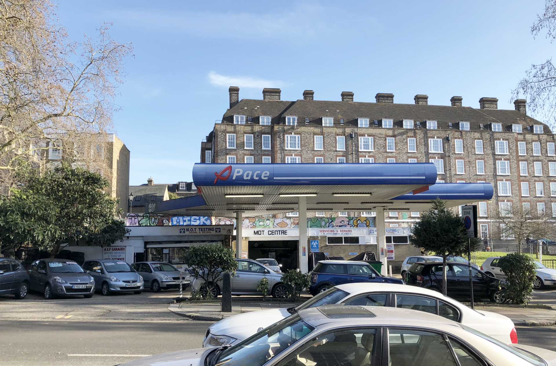 This gas station was replaced with six townhouses.