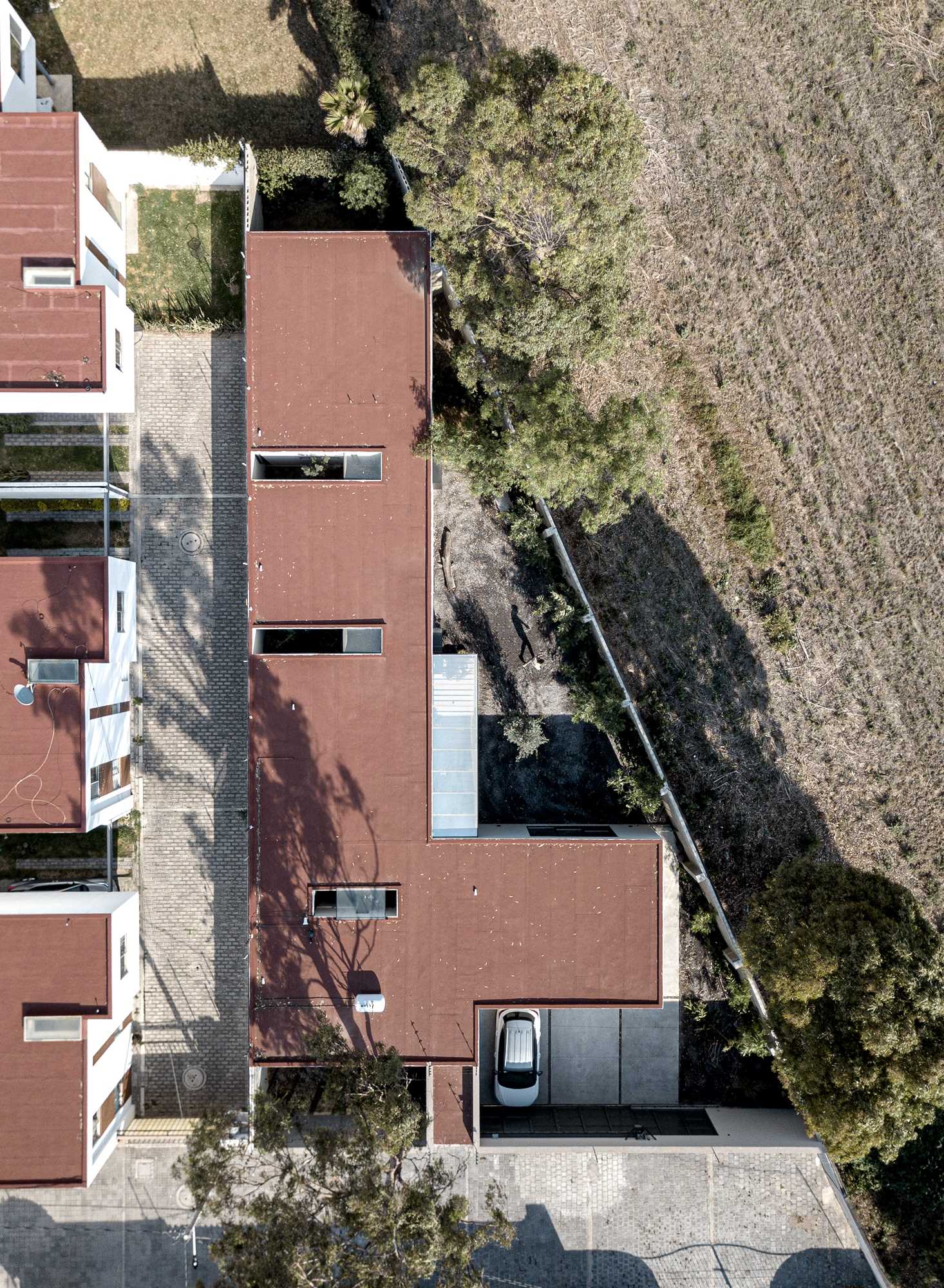 A modern home on an irregular shaped lot.