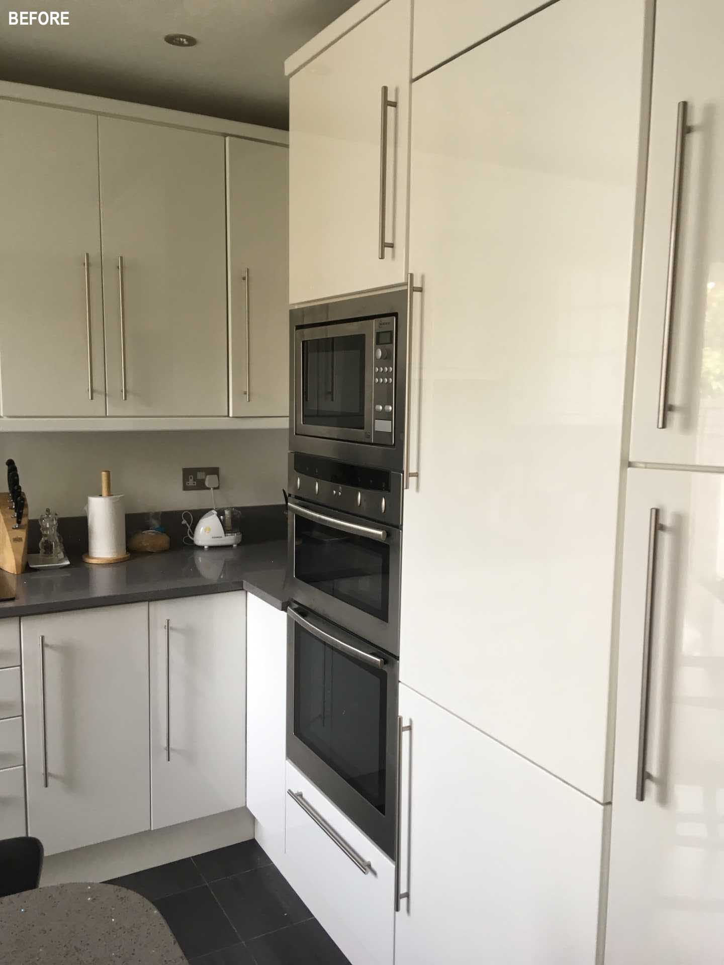 BEFORE - a small white kitchen.