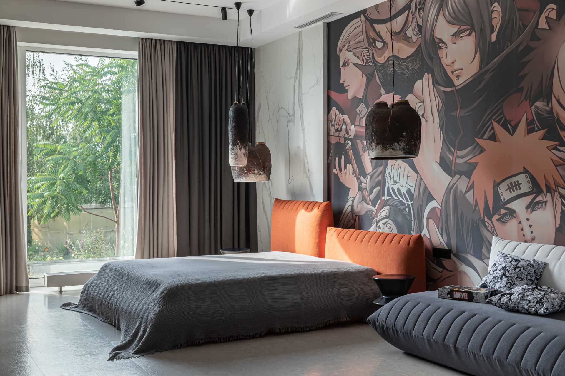 In this modern bedroom, a large mural covers the wall, while the furniture colors complement the artwork.