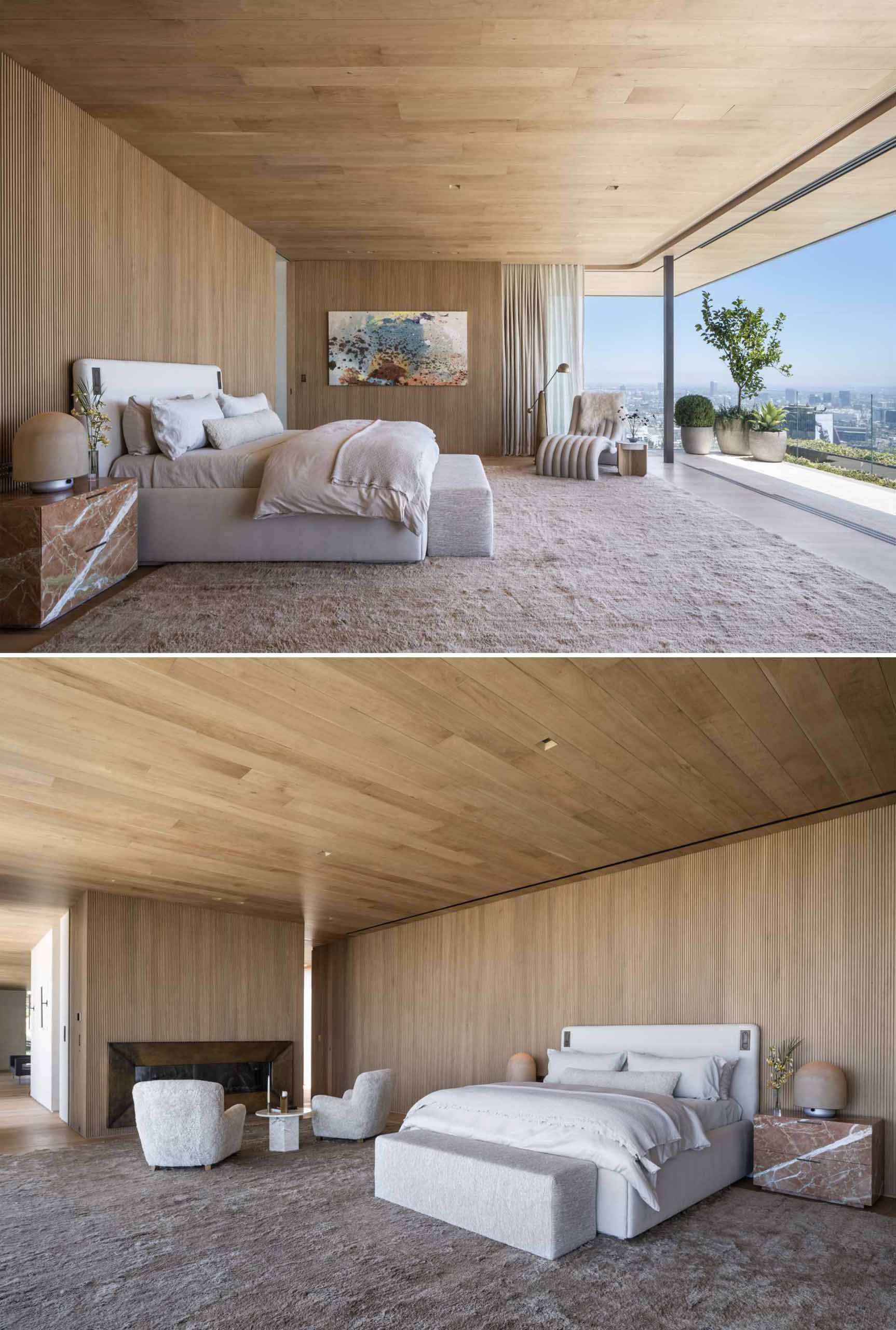 A modern wood-lined bedroom interior with a fireplace and glass wall that opens to a balcony.