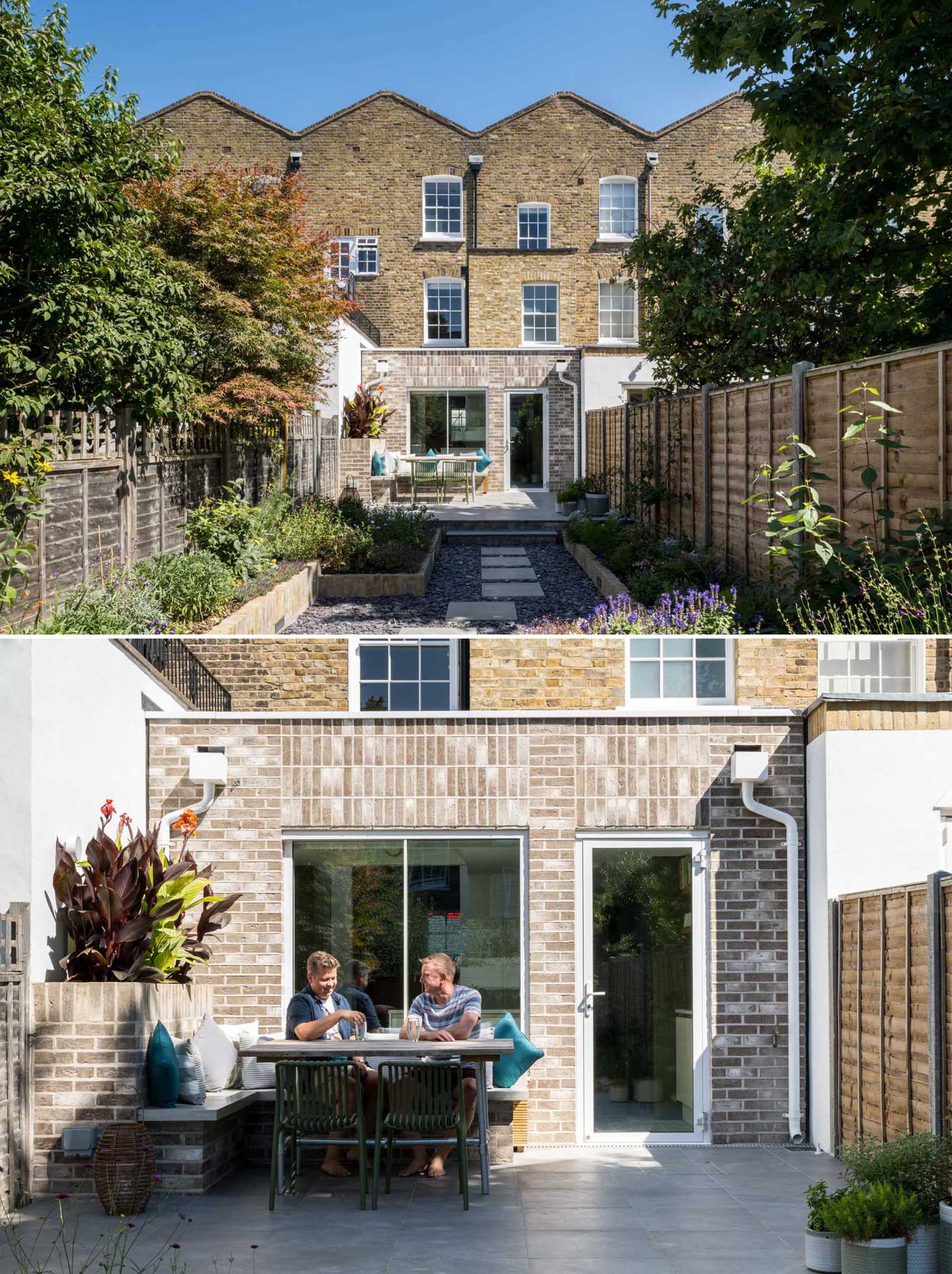 A Grade II listed terrace home in Islington, England, received a new brick addition with outdoor seating, and an updated garden.