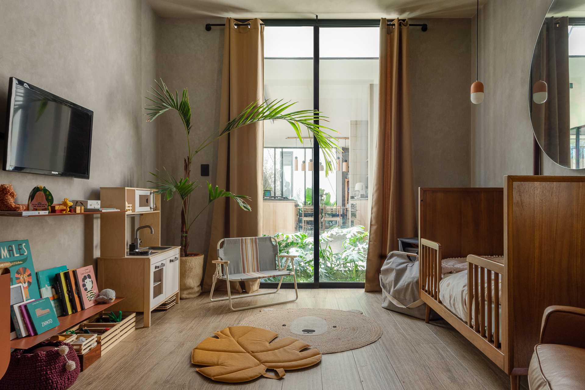 A modern kids bedroom with plenty of open floor space for playing.