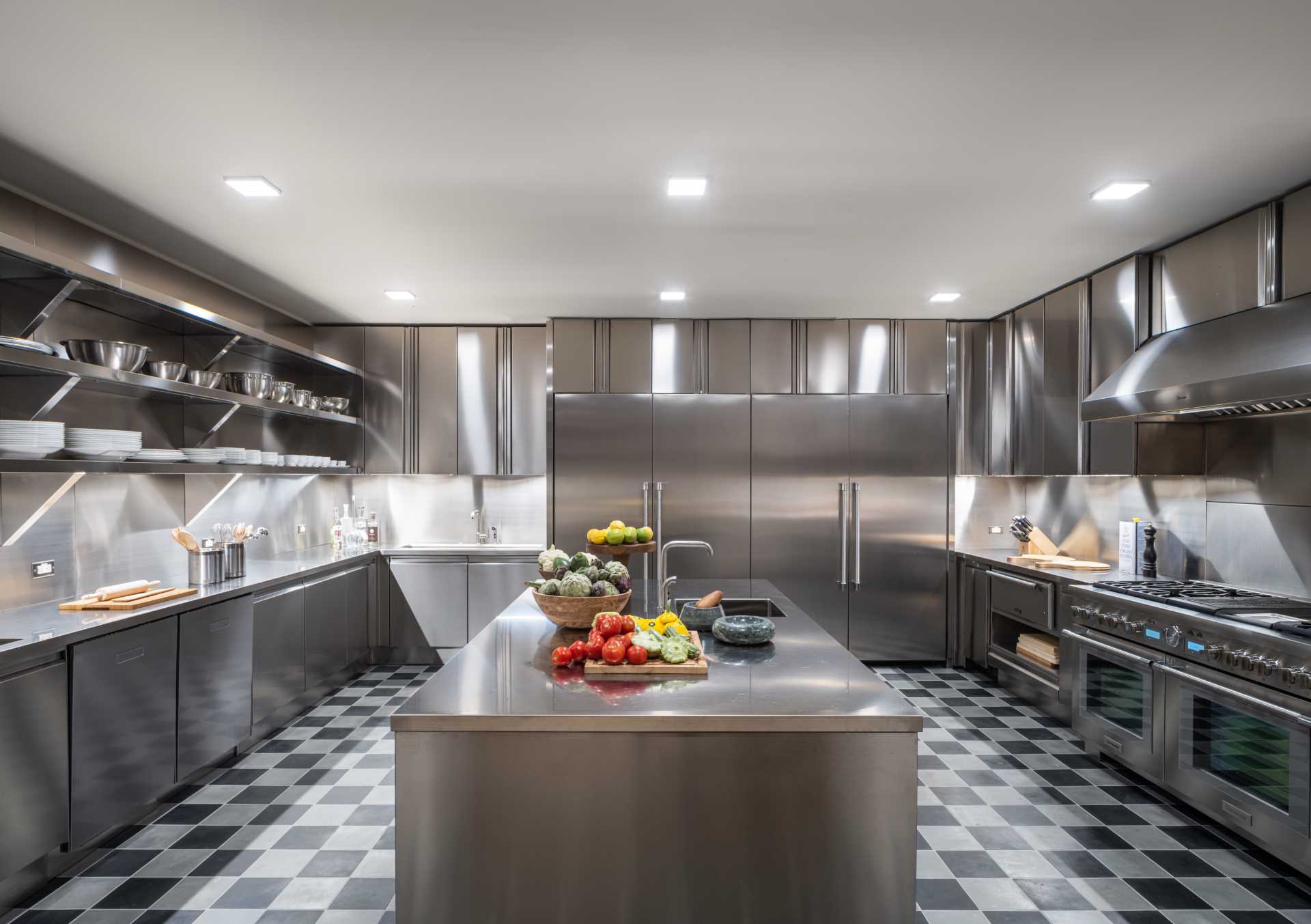 A modern stainless steel chefs kitchen.