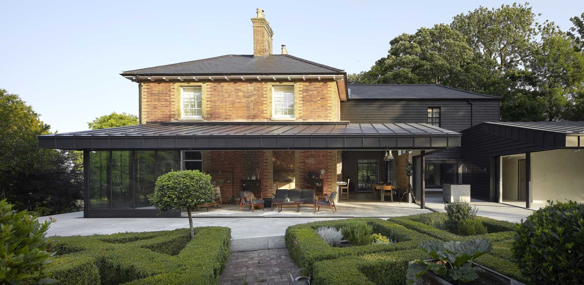 A modern home addition for an 1830s brick farm house.