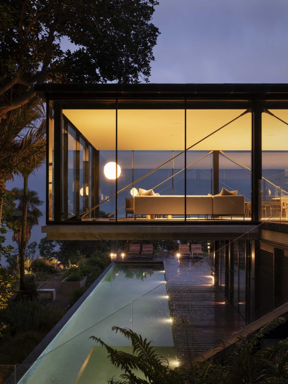 This Home Has A Living Room That Extends Over The Swimming Pool Below