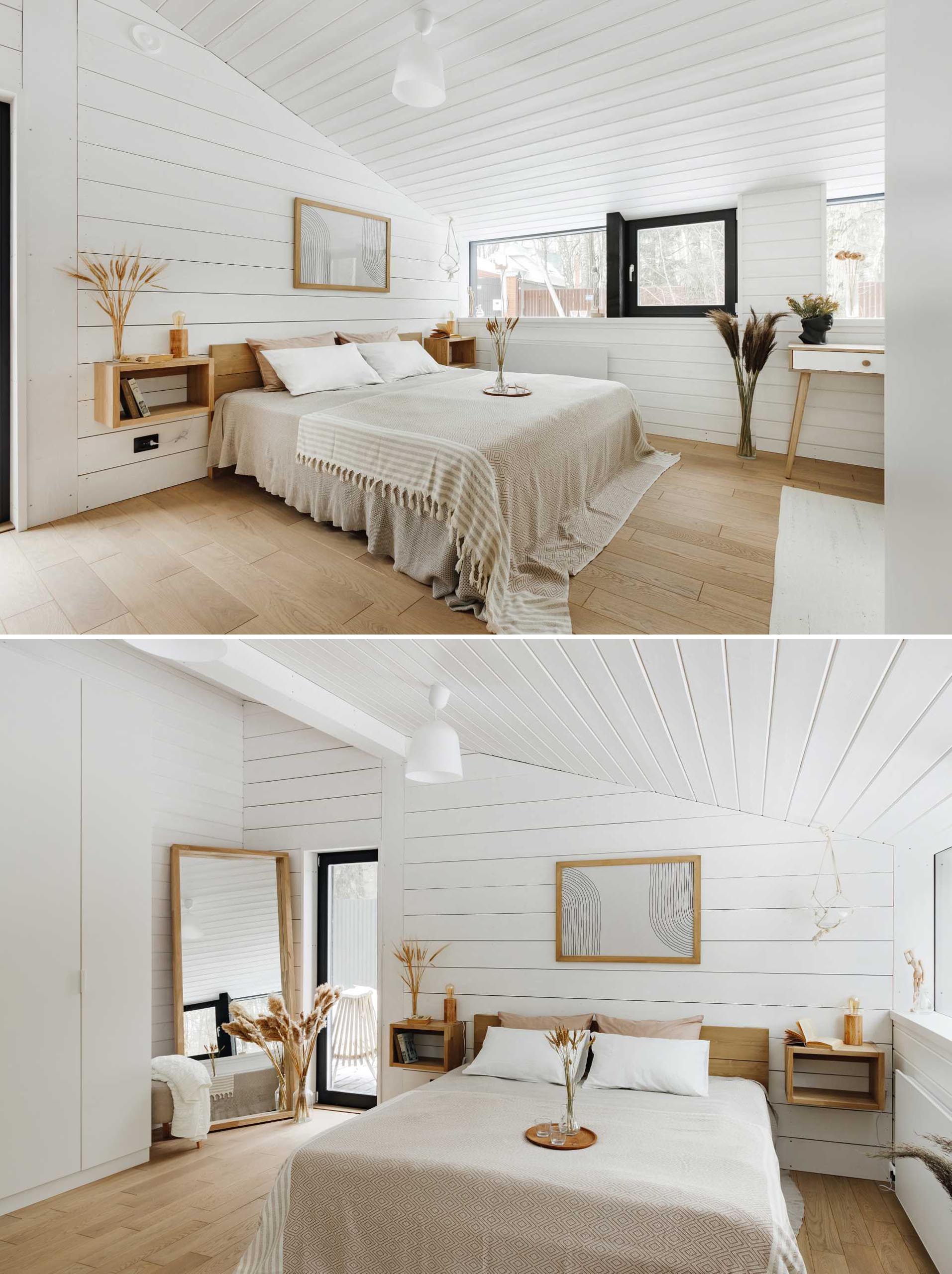 A contemporary white and wood bedroom.