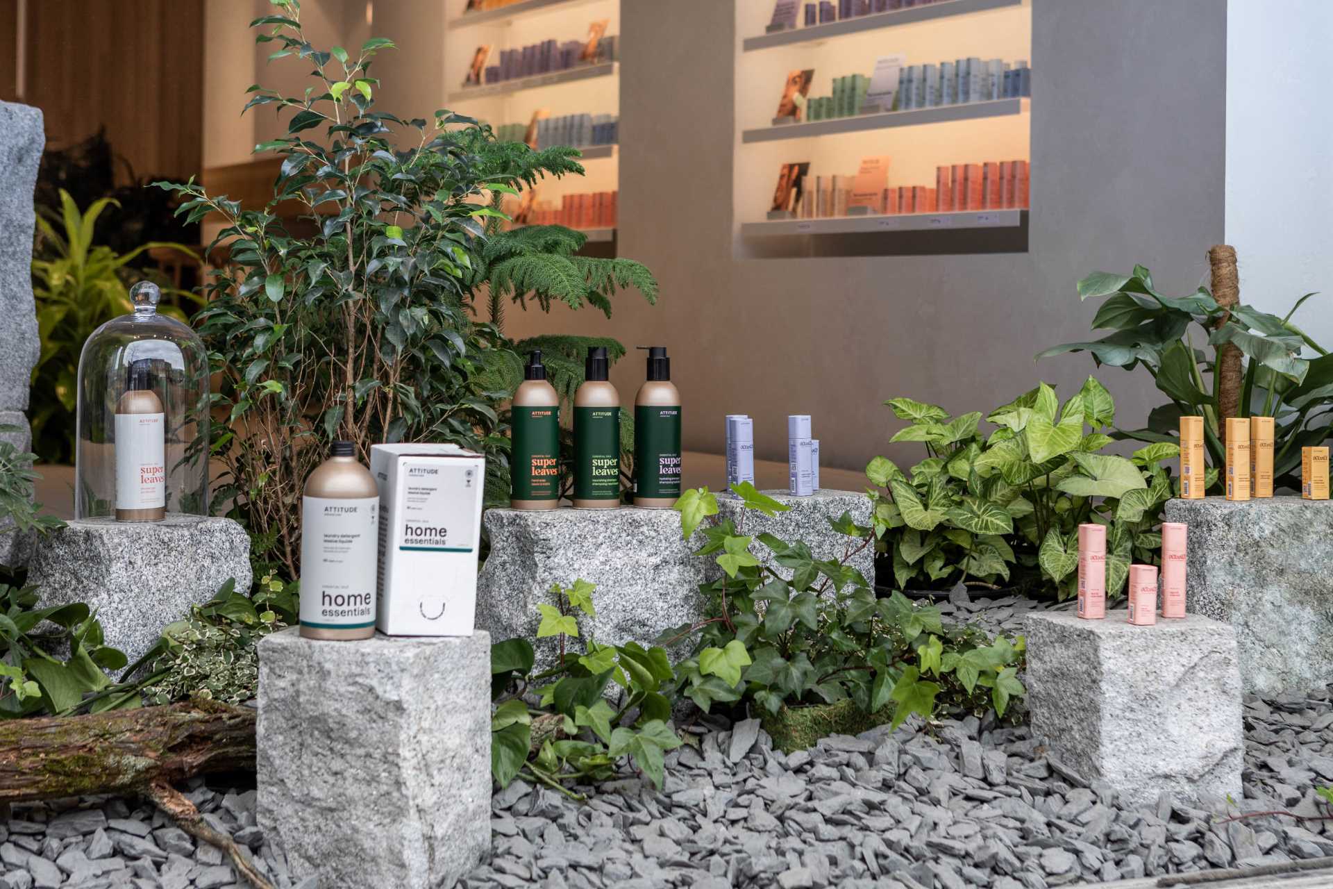 A modern retail store with built-in planters throughout.