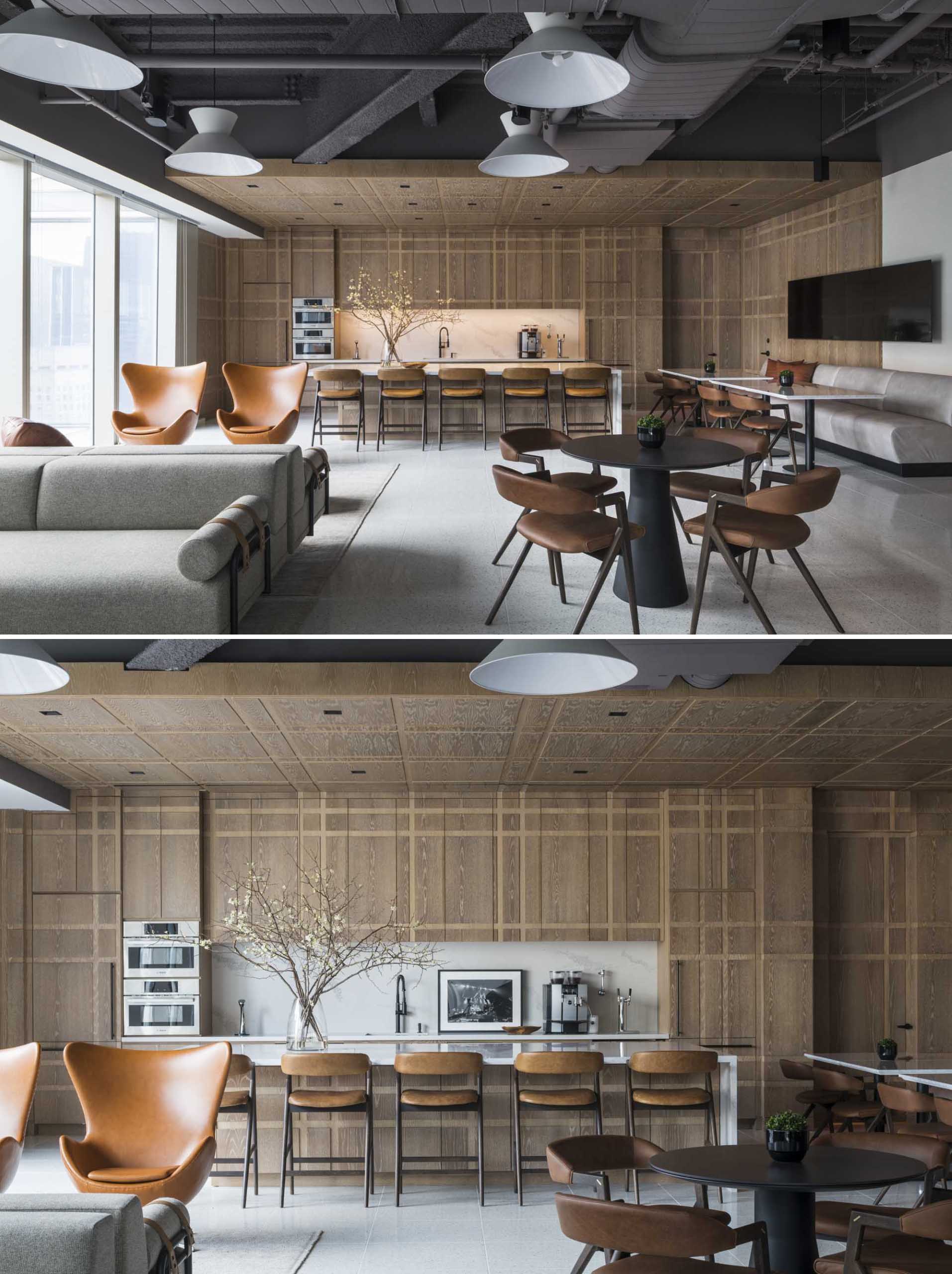 This plaid-inspired wood-clad kitchen was conceived as a pochéd white oak bookend, with wood covering all cabinets, appliances, doors, and the island.