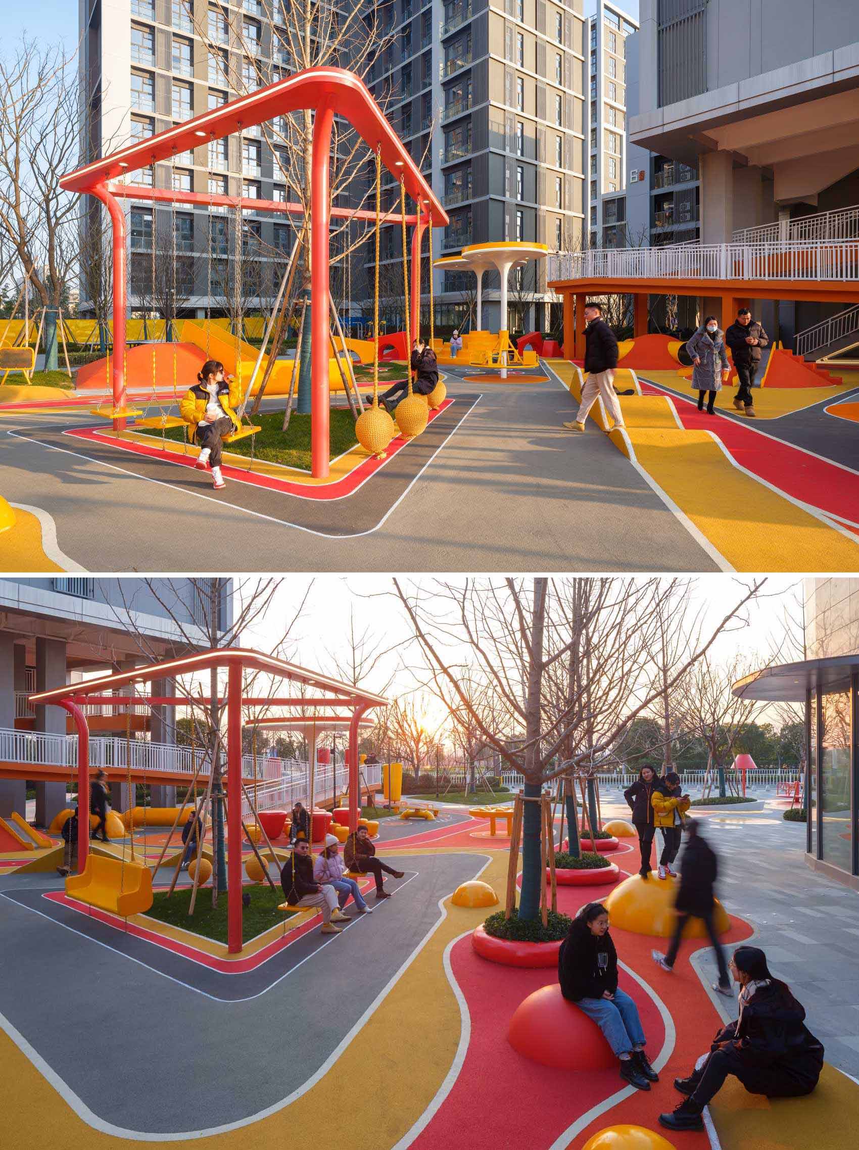 A modern and colorful landscaped park with slides, pathways, a merry-go-round, lounge seating, seesaw, shading structures, seating, swings, and an amphitheater.