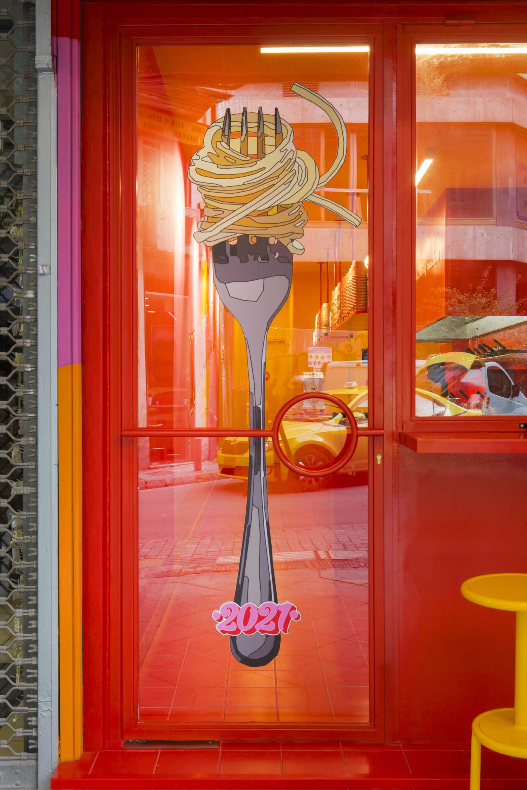 The door illustration of this pasta shop, depicts the classic pasta twirl on a fork, that works as a mouthwatering trigger for any unsuspecting passerby.