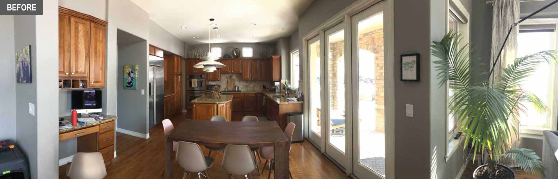 BEFORE - A dated kitchen includes builders-grade kitchen with wood cabinets that made the space quite dark.