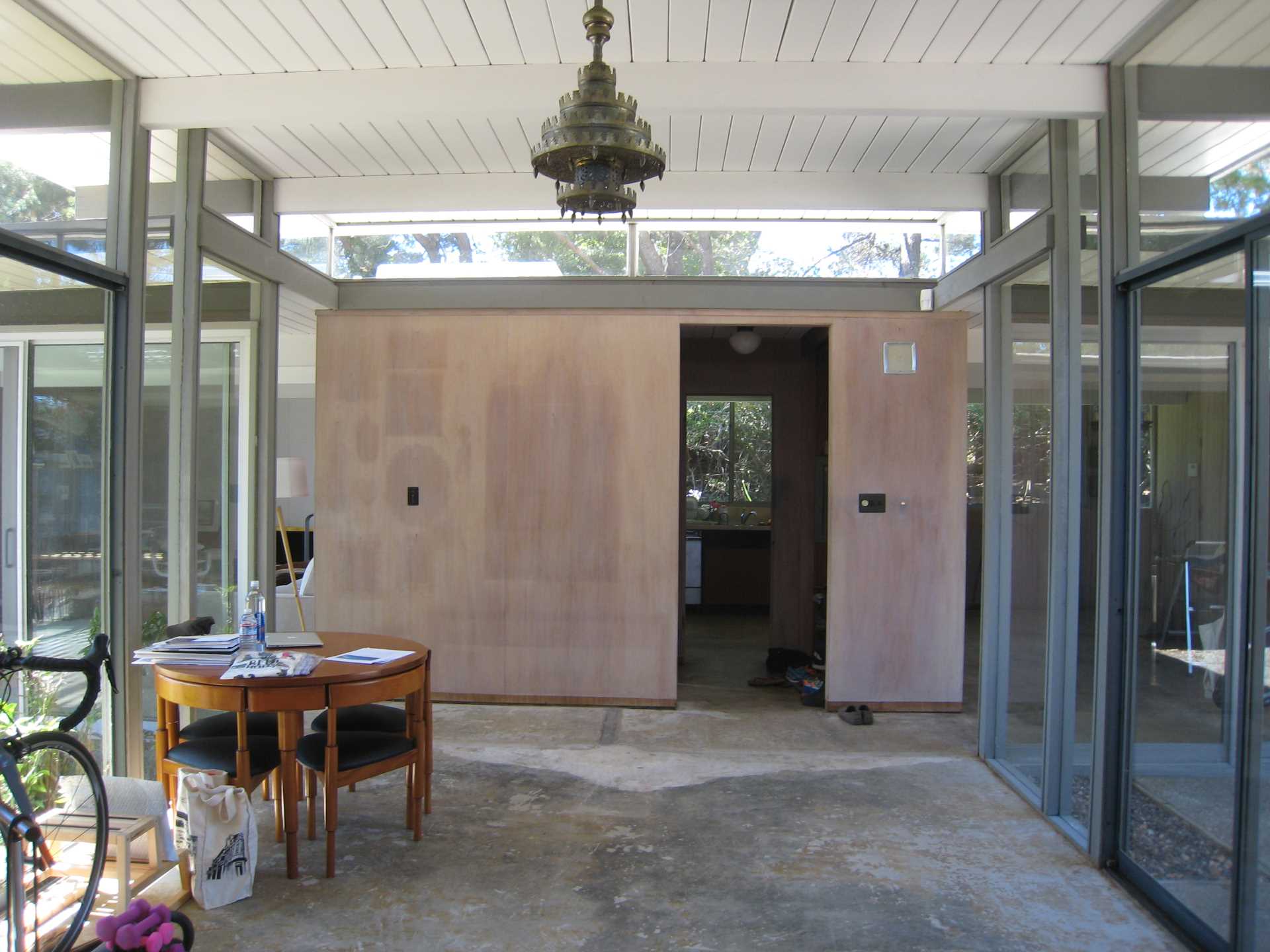 'Before' dining room photo of an Eichler home.