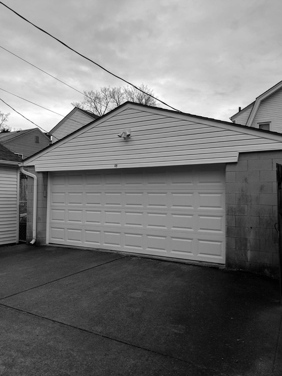 A Garage Transformed Into An Apartment With A Home Office
