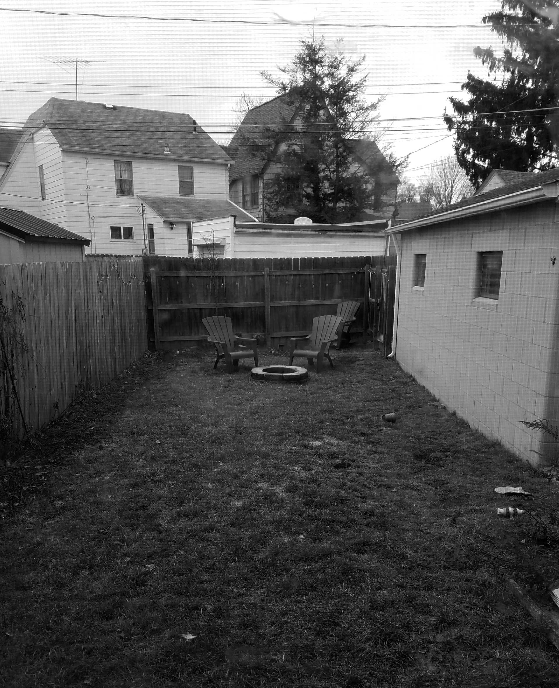 'Before' photo of a small yard.