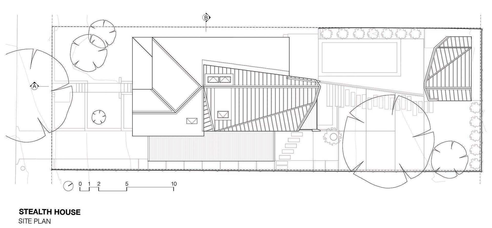 The site plan of a home with a two-storey rear addition, swimming pool, and cabana.