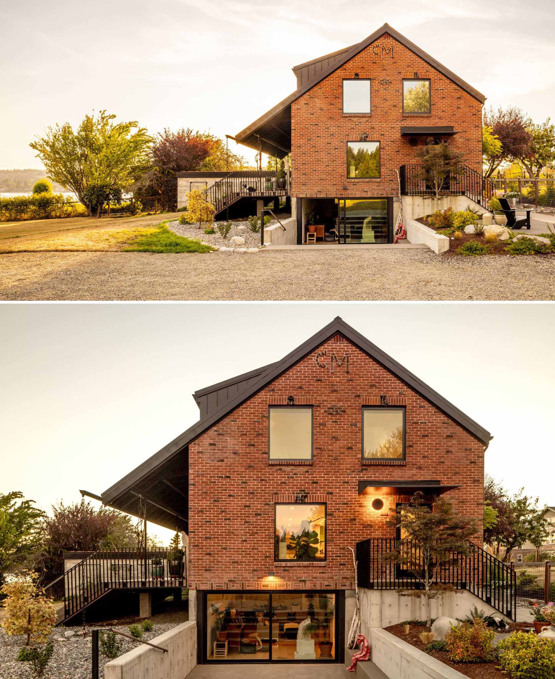 A remodeled brick farmhouse now includes a large patio and steps that lead down to a lower level with a media room.