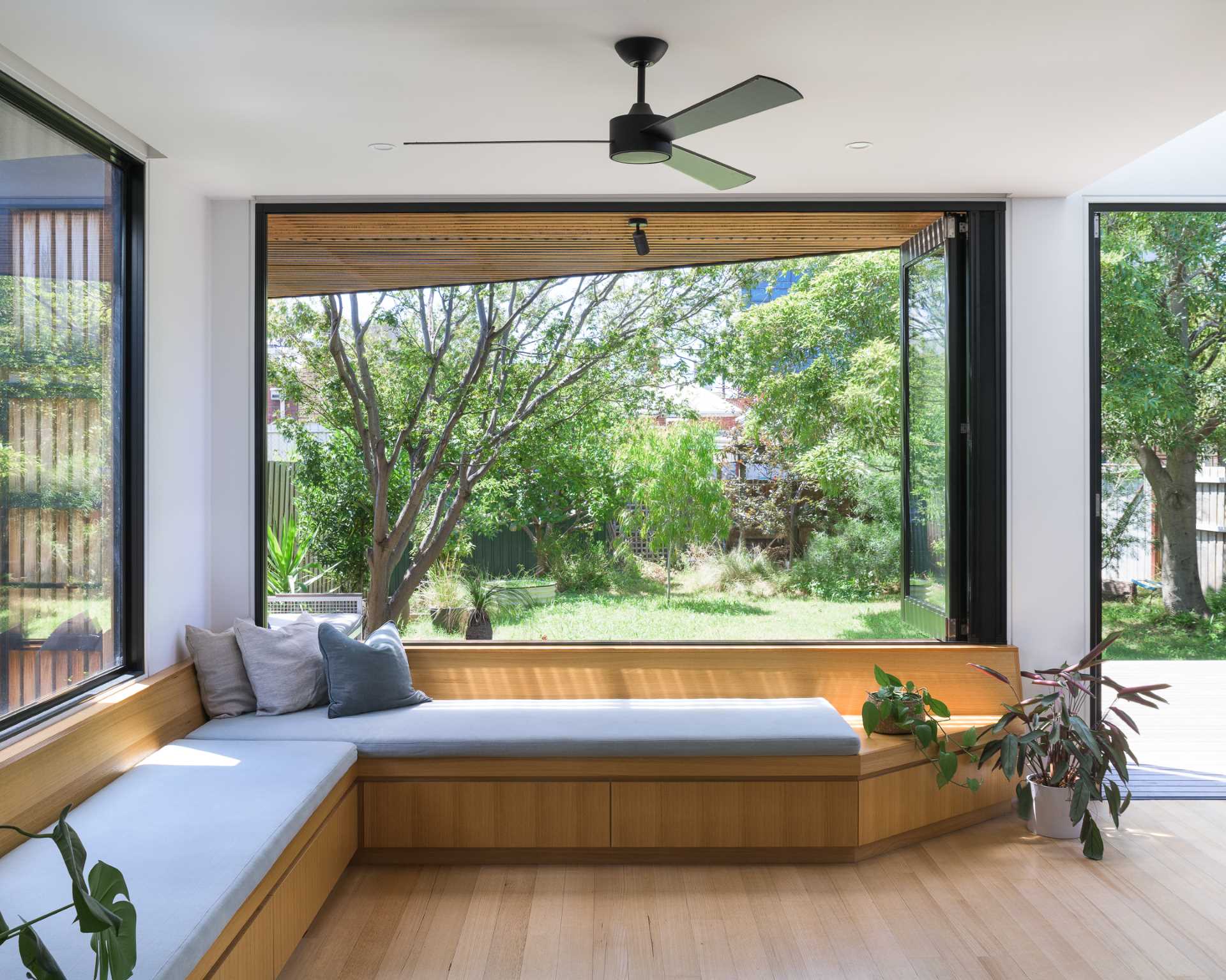 A modern rear extension with built-in L-shaped bench seating.