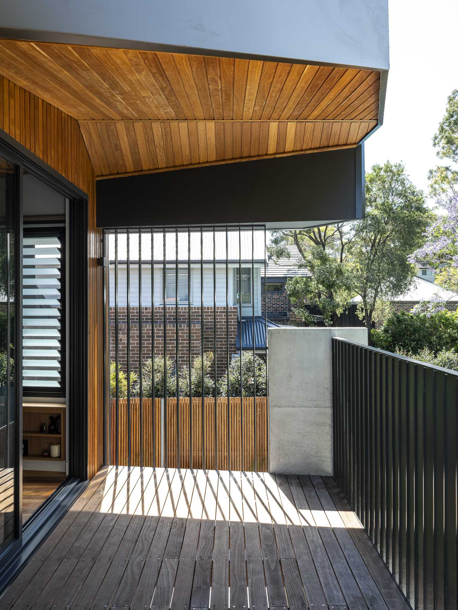 A private balcony located off a bedroom.