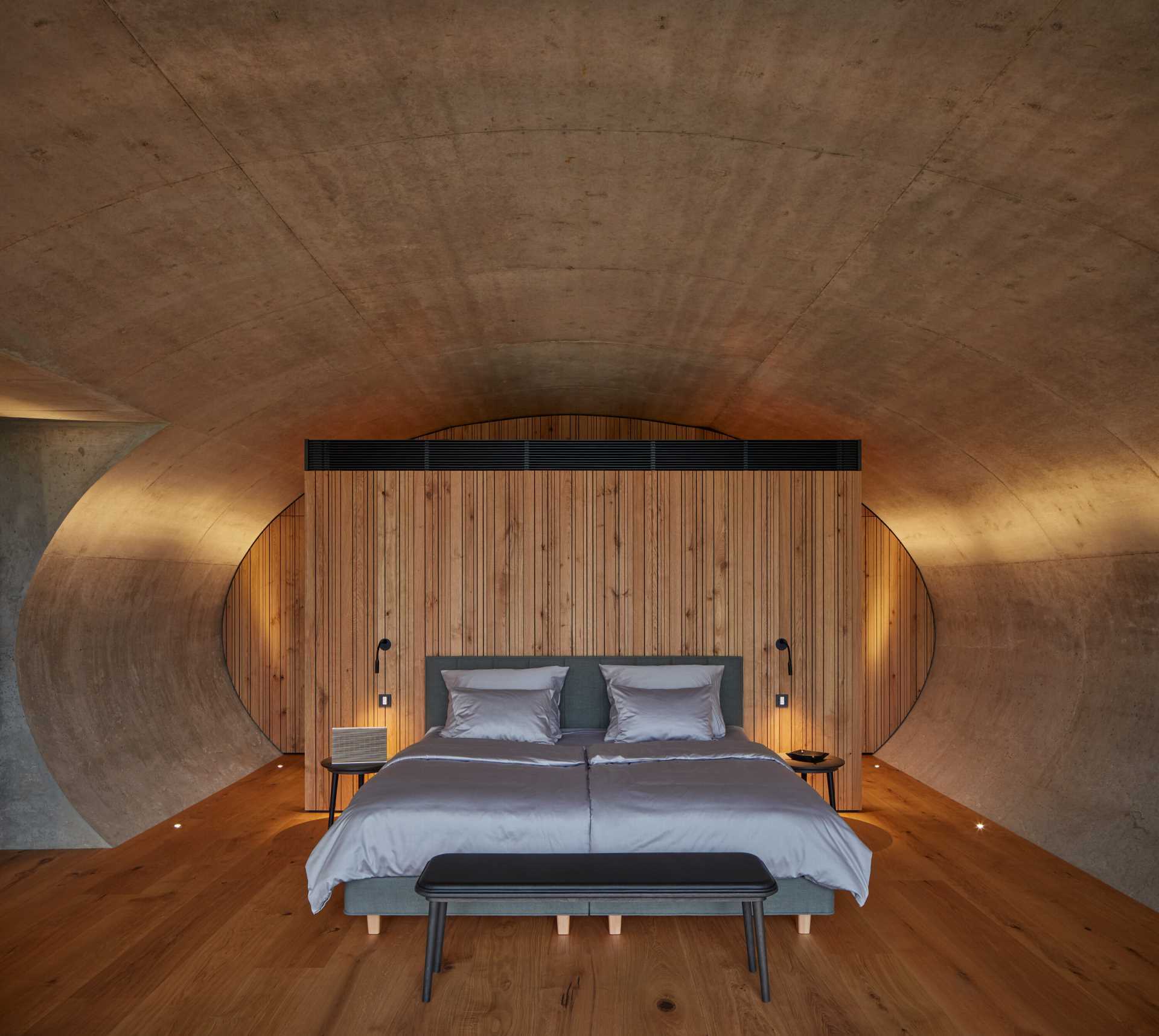 This winery hotel room has its own unique rounded design, with doors that open to a semi-private patio with views of the vineyard.