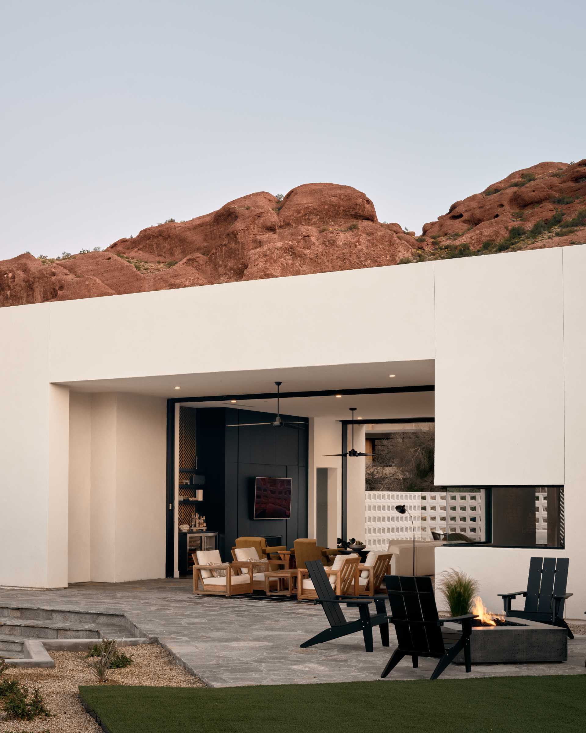 A mid-century modern inspired home with a flagstaff patio.