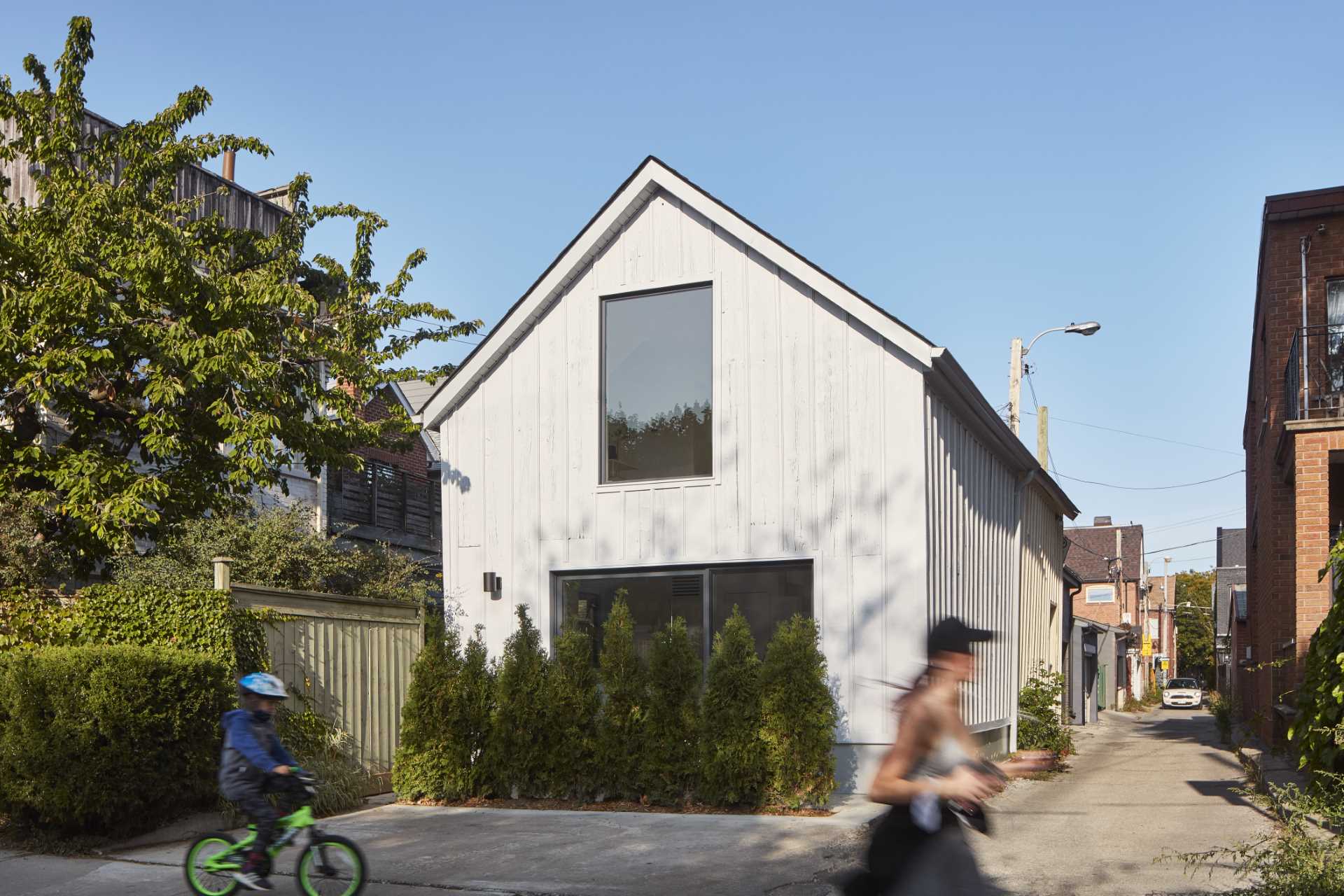 A garage has been converted into a small laneway house.