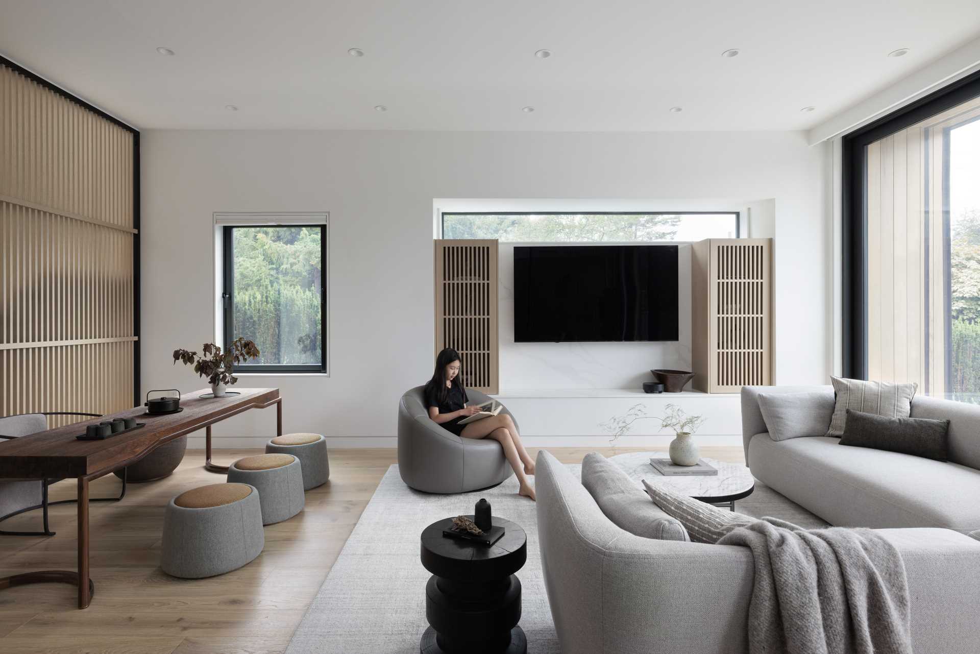 A modern living room with a designated tea drinking area.