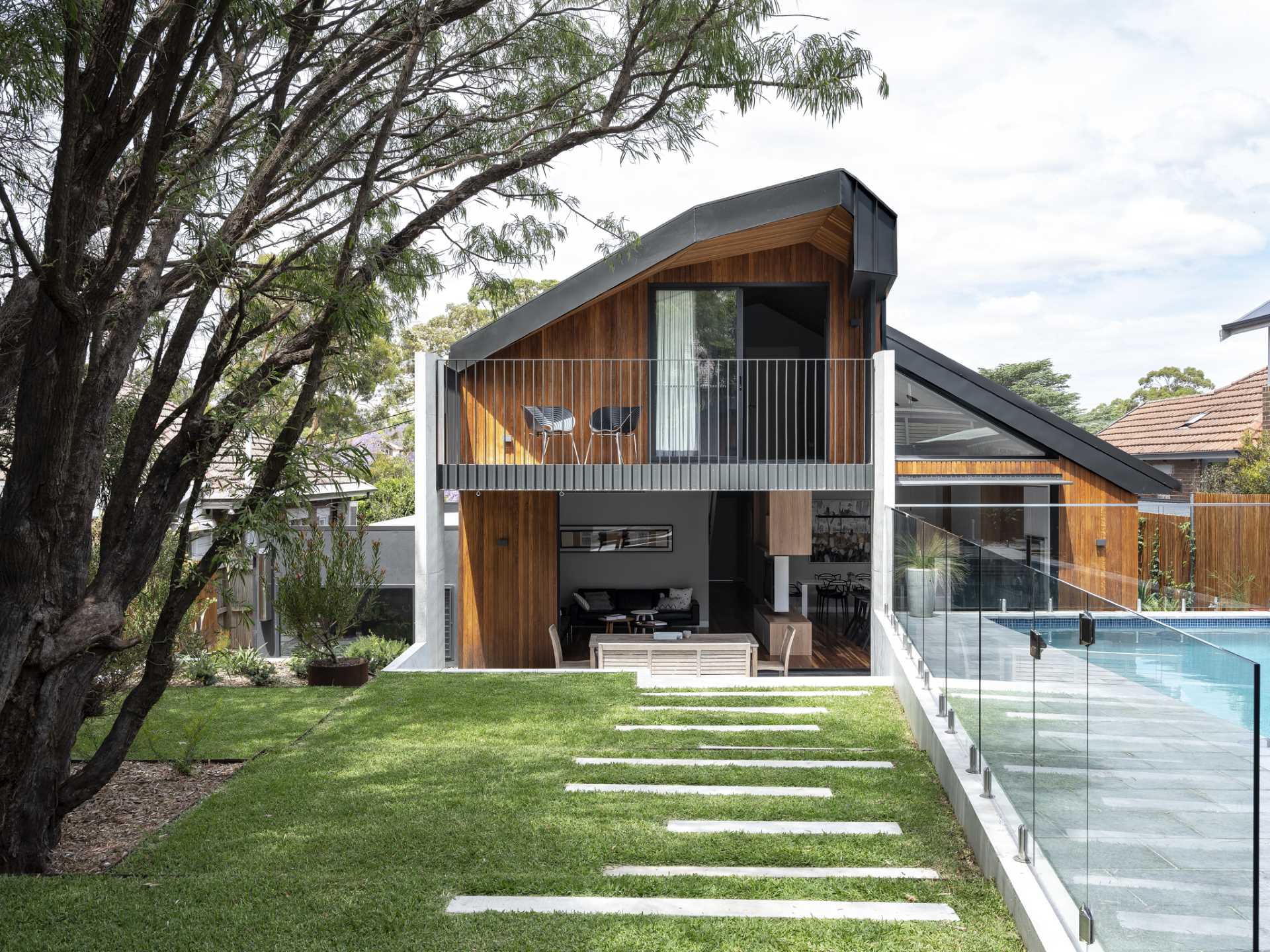 A modern two-storey rear addition for an inter-war cottage in Australia.