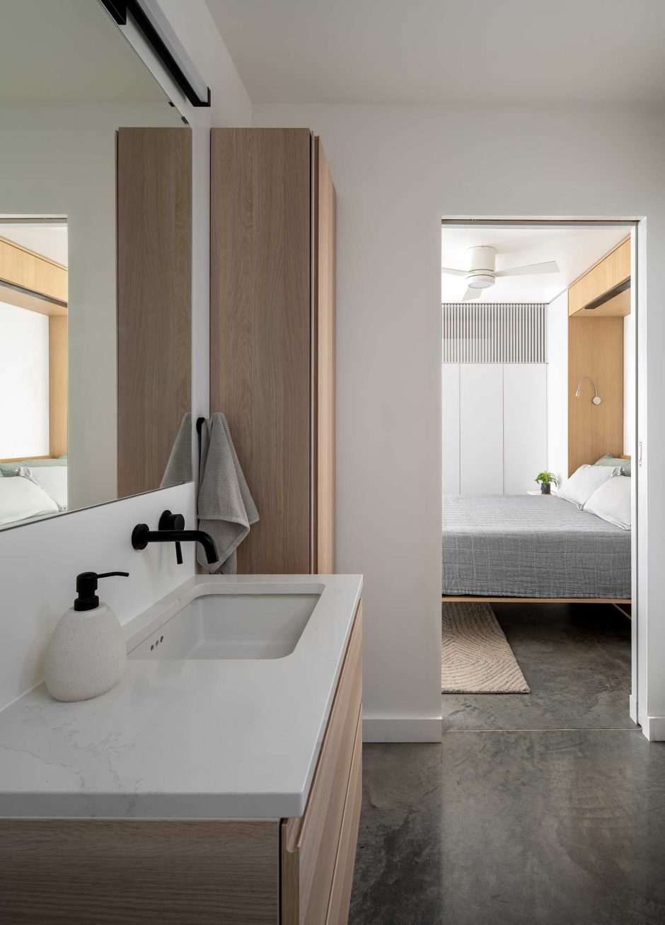 A Garage Transformed Into An Apartment With A Home Office