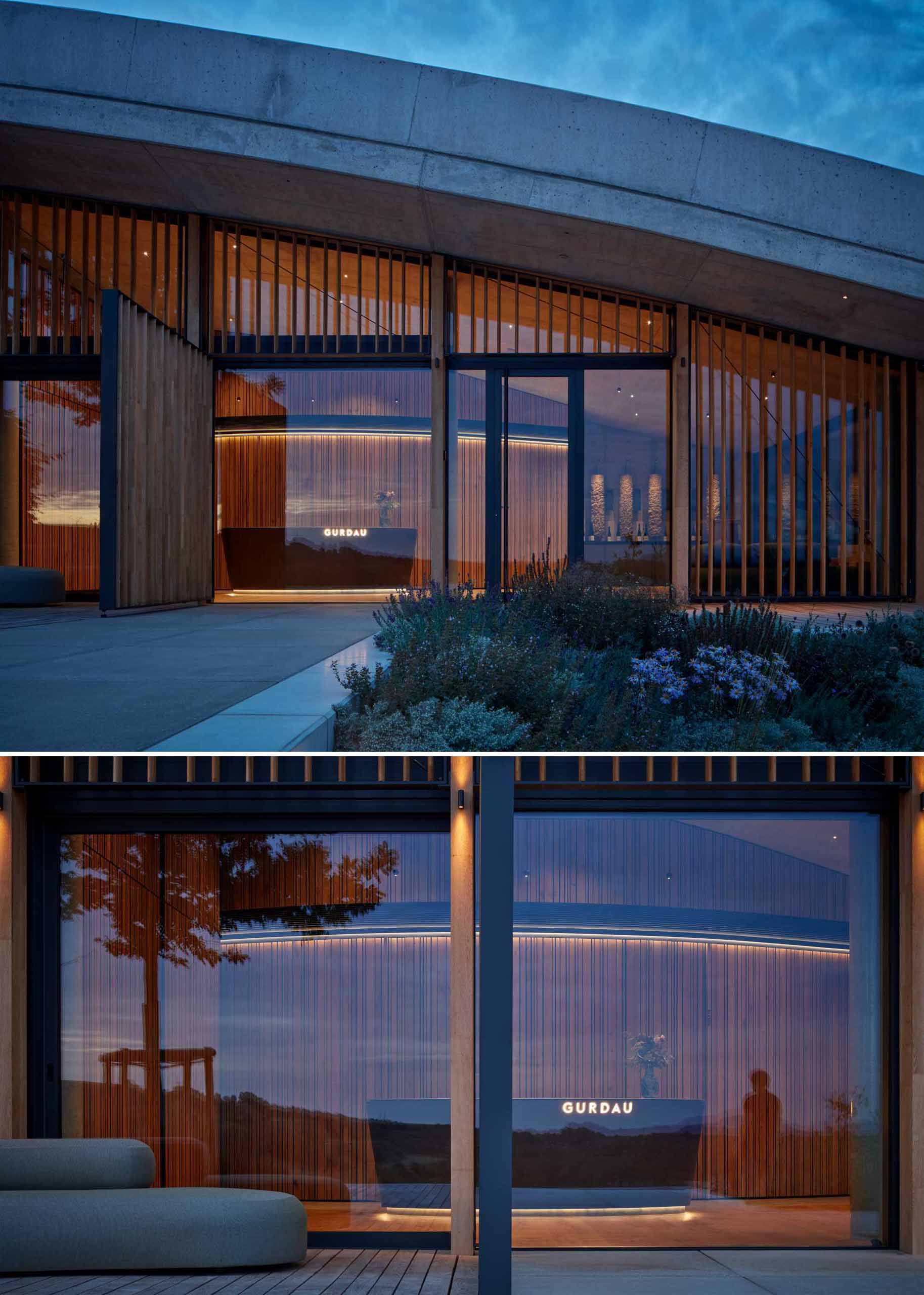 To prevent overheating in the hottest summer months, this modern winery has thermally insulating triple glazing is designed in combination with wooden oak slats in front of the windows.