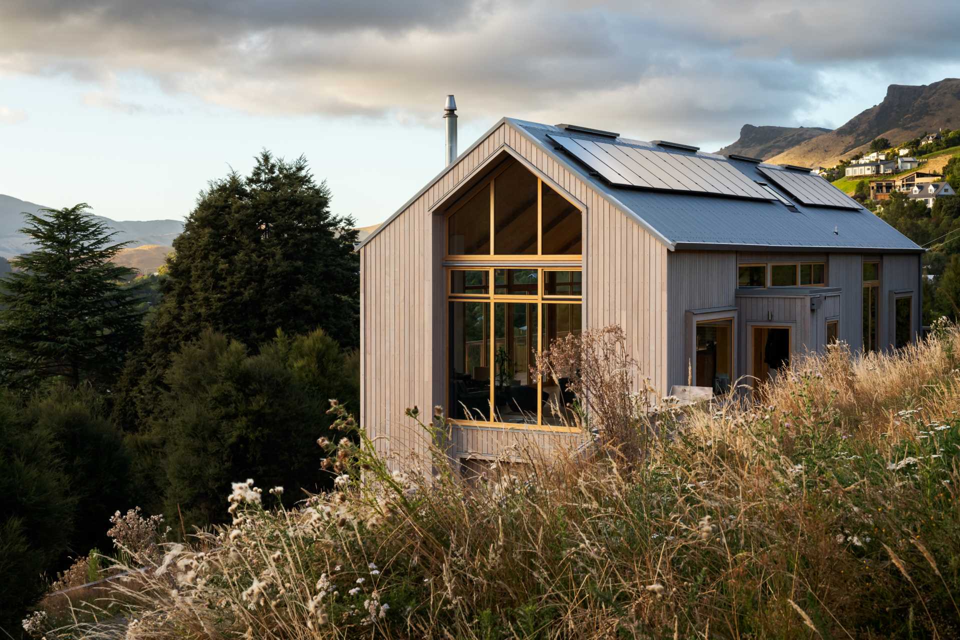 A modern wood home with a gable form.