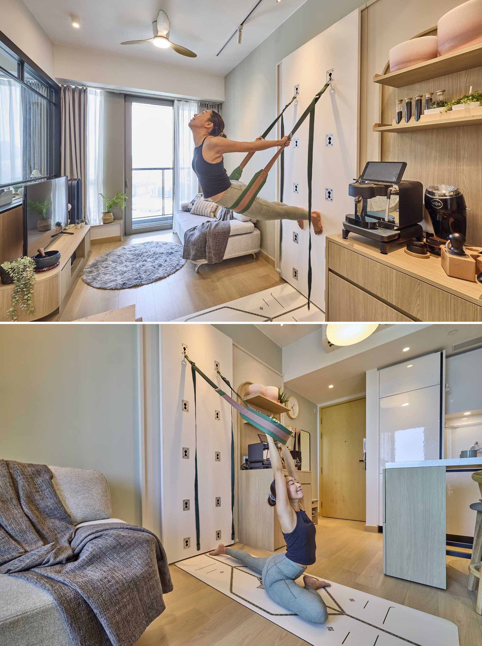 A small apartment includes safe and secured yoga wall with rope hooks and belts allows yoga to be practiced at home